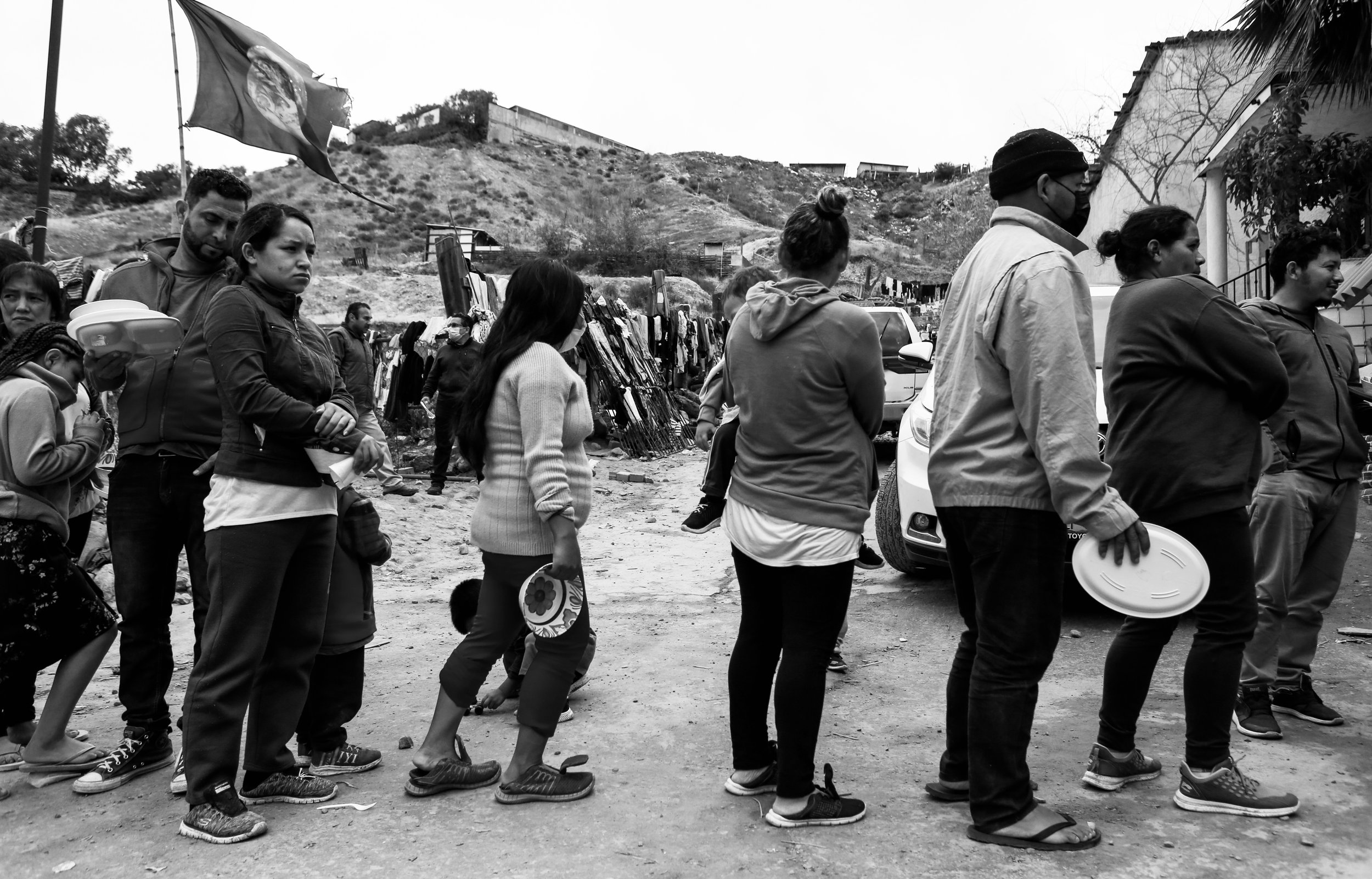  Hungry families wait in line for food outside Embajadores de Jesus. The church, run by Pastor Banda and Pastora Zaida, has a max capacity of 1,000 but with 50-100 migrants coming and leaving daily, it’s not easy to keep track of how many mouths need