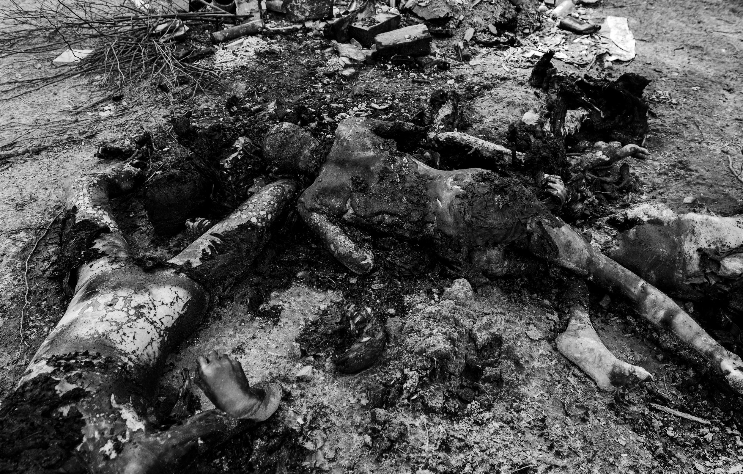  Bodies of a family of four lay tortured and burned in a pile in Bucha, Ukraine following a month of Russian occupation. 