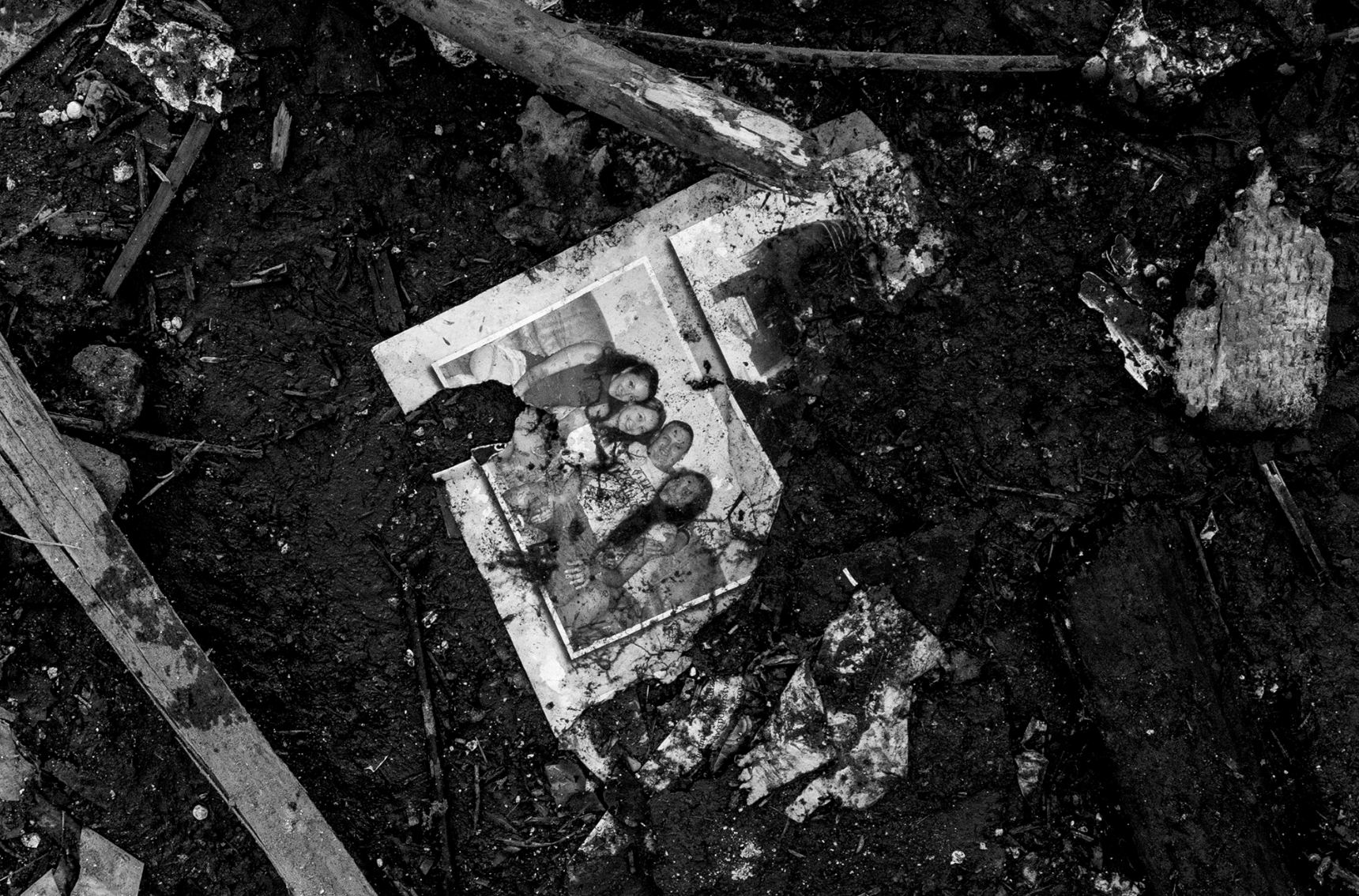  A family photo sits in the ruble remains of a house in Kharkiv, Ukraine that was hit by a Russian airstrike. 