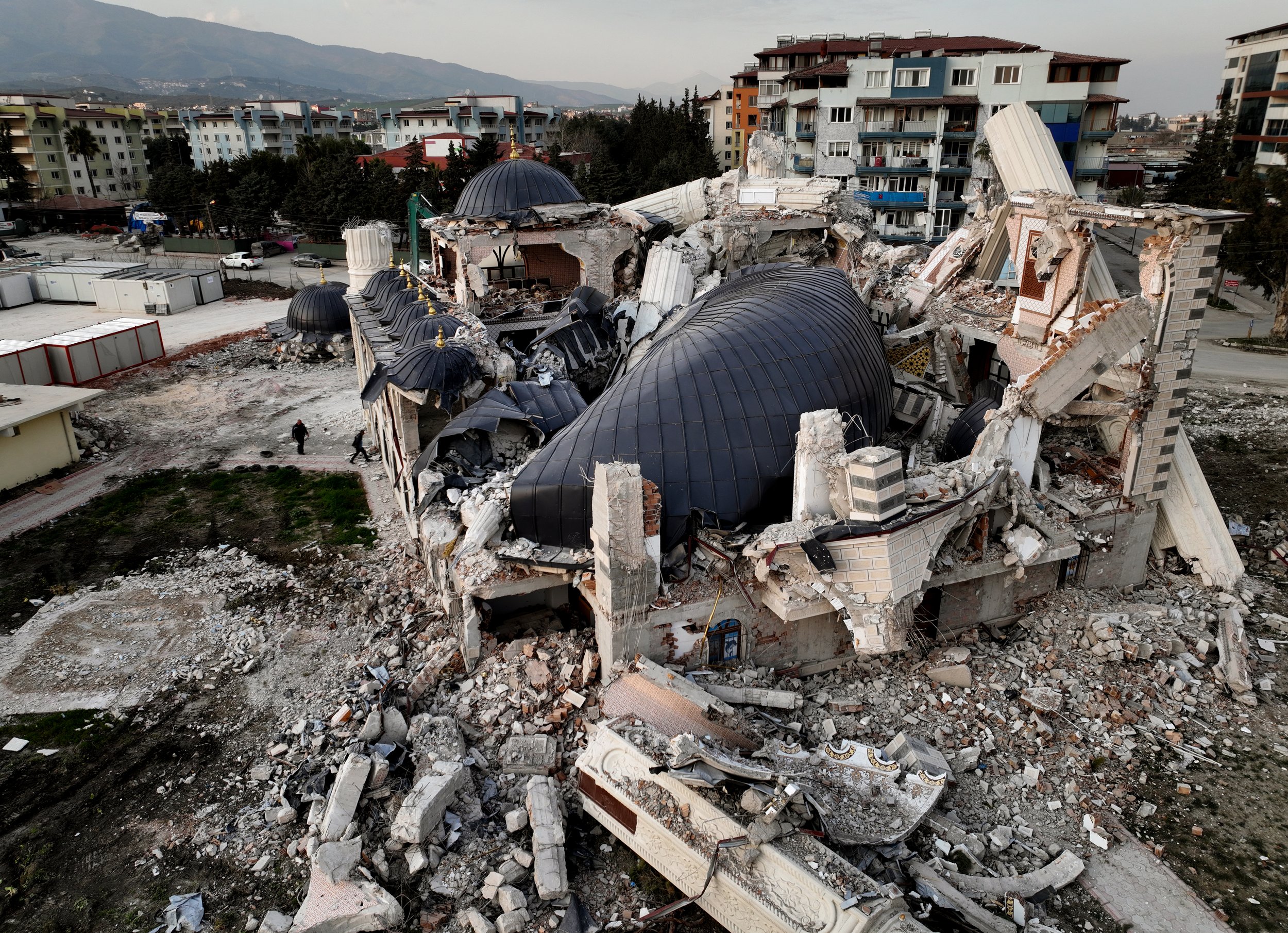  A destroyed mosque in Hatay, Turkey on February 24, 2023. Civilians run inside to recover Qurans and other artifacts after continued earthquakes shake the region. 