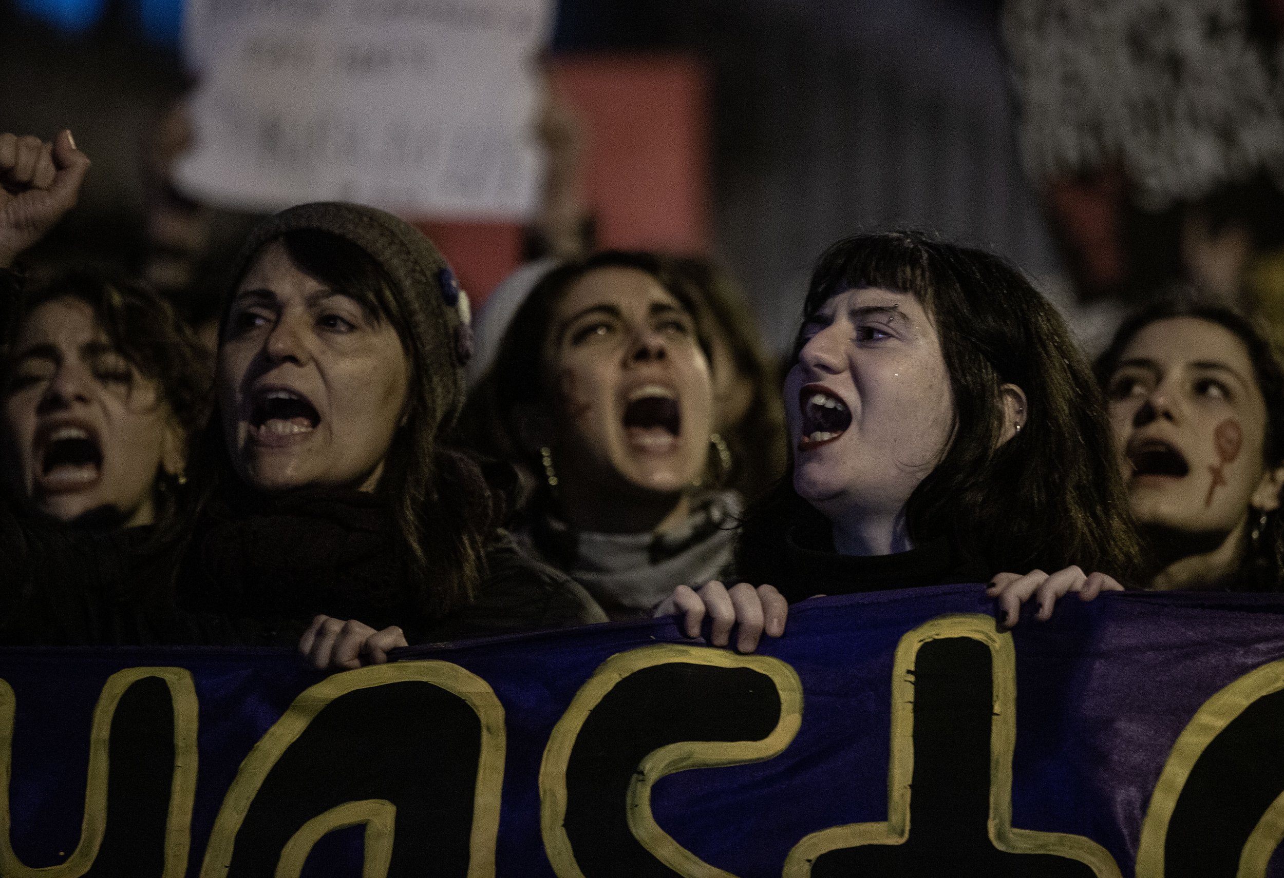  Women scream their demands as police start to close in on the thousands in the street protesting women’s rights.  