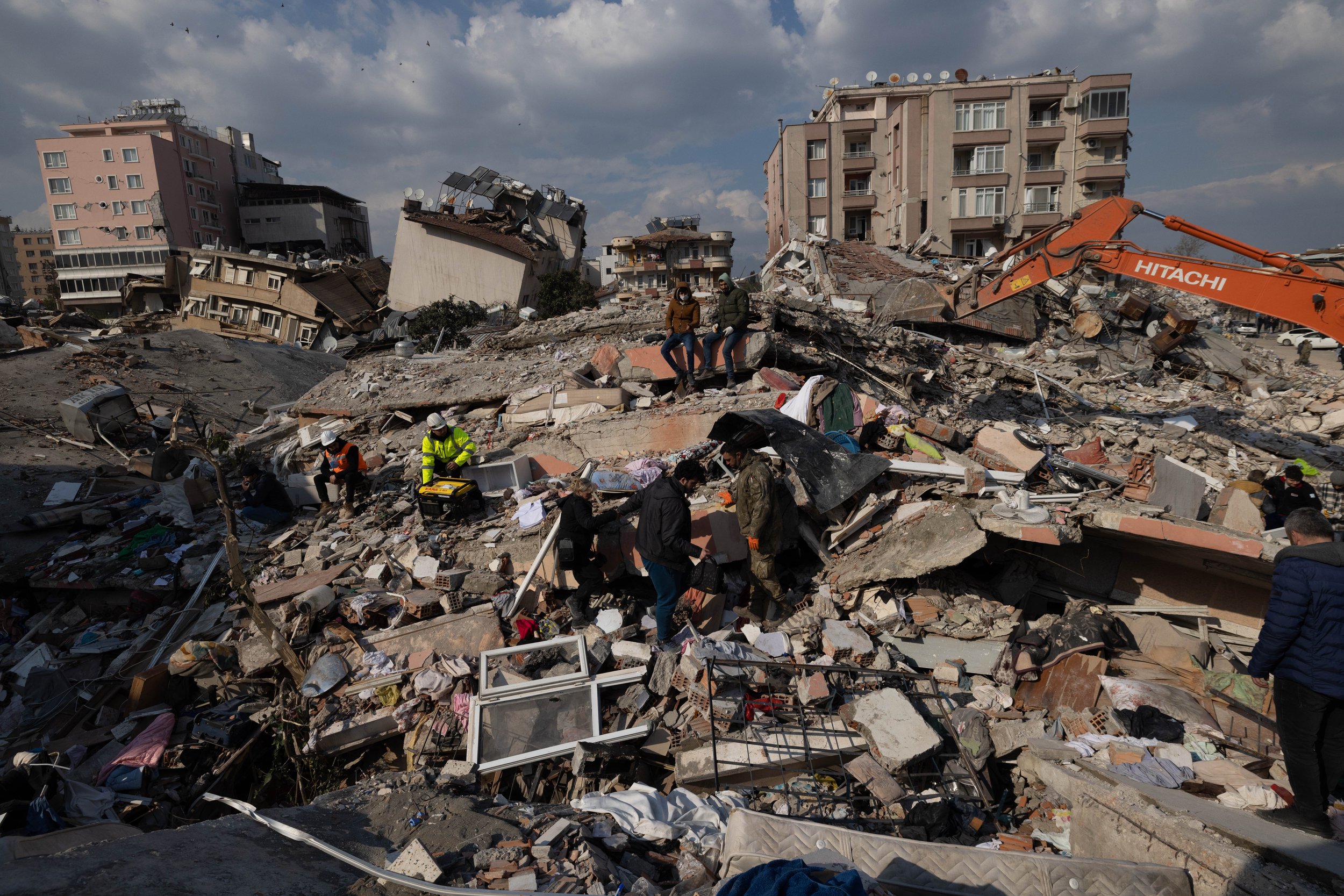 Rescue workers dig through rubble with hopes of hearing sounds of life on February 11, 2023, in Hatay, Turkey. 