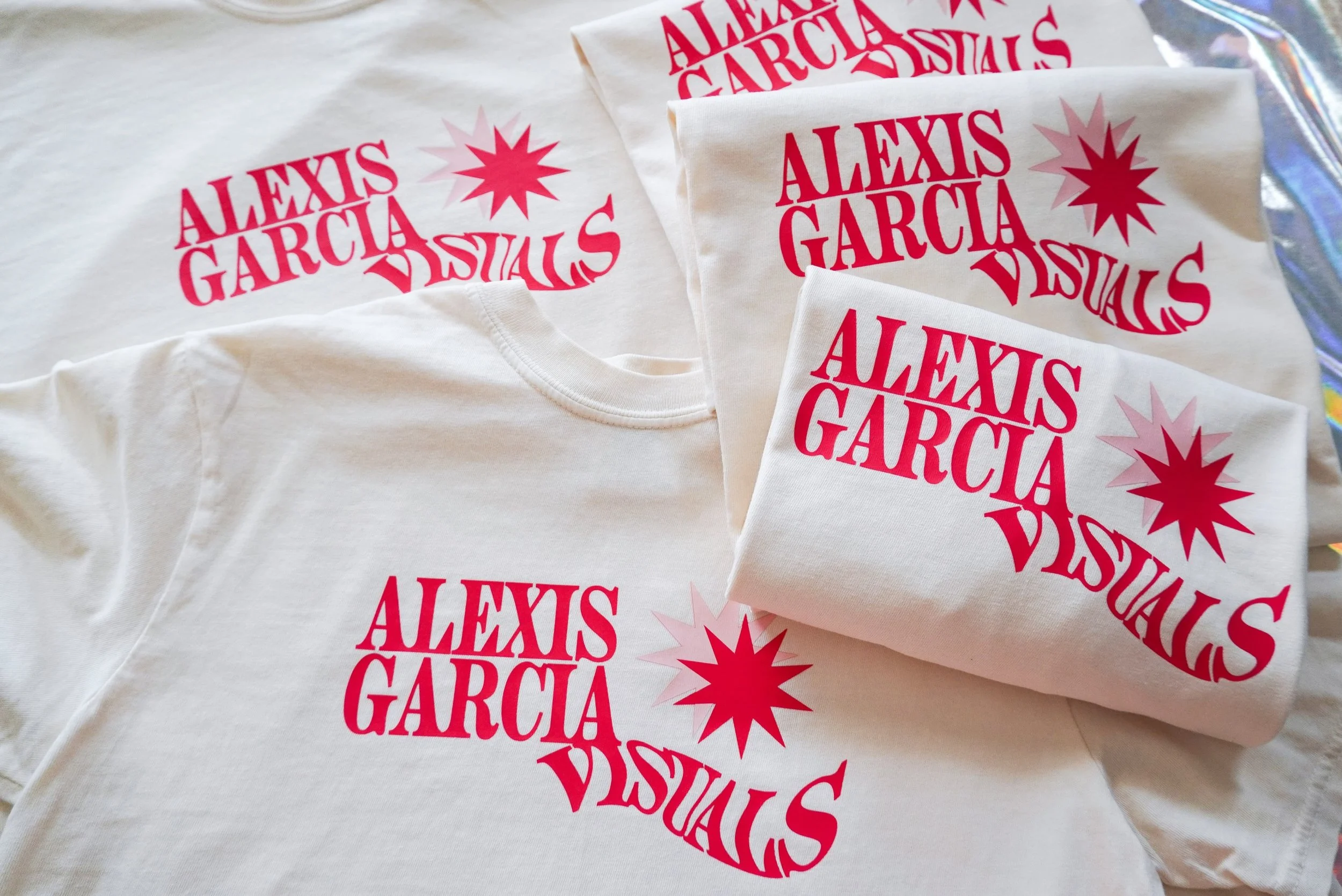 I shifted my art business name a million times. A small town girl with some BIG dreams &amp; not afraid to chase em. 2020 my name changed to Alexis Garcia Visuals &amp; has stuck!!💥🧚🏼&zwj;♀️

3 years ago in 2023 I released my Original AGV Logo Tee