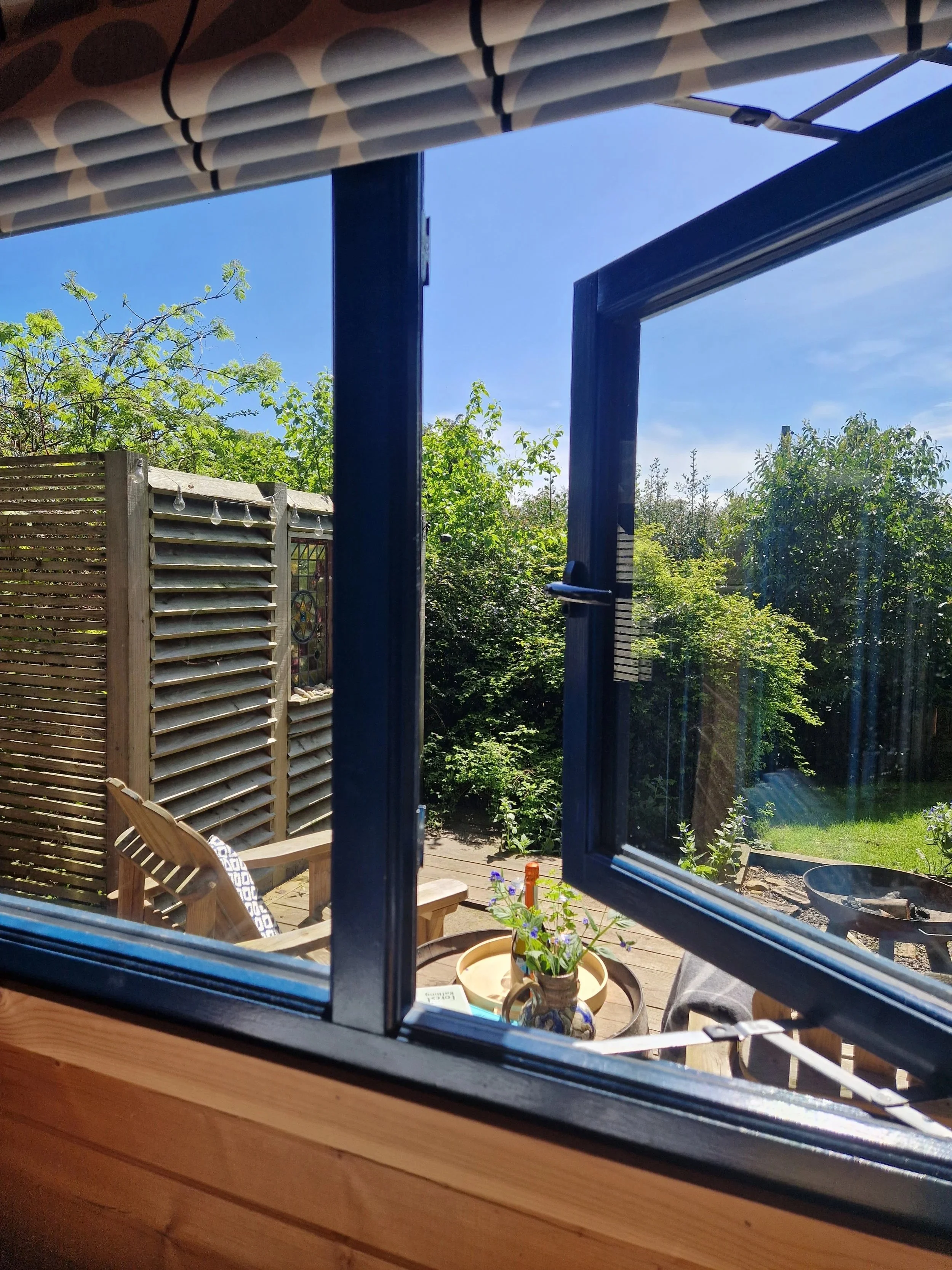 view-to-garden-from-secret-cabin-bed