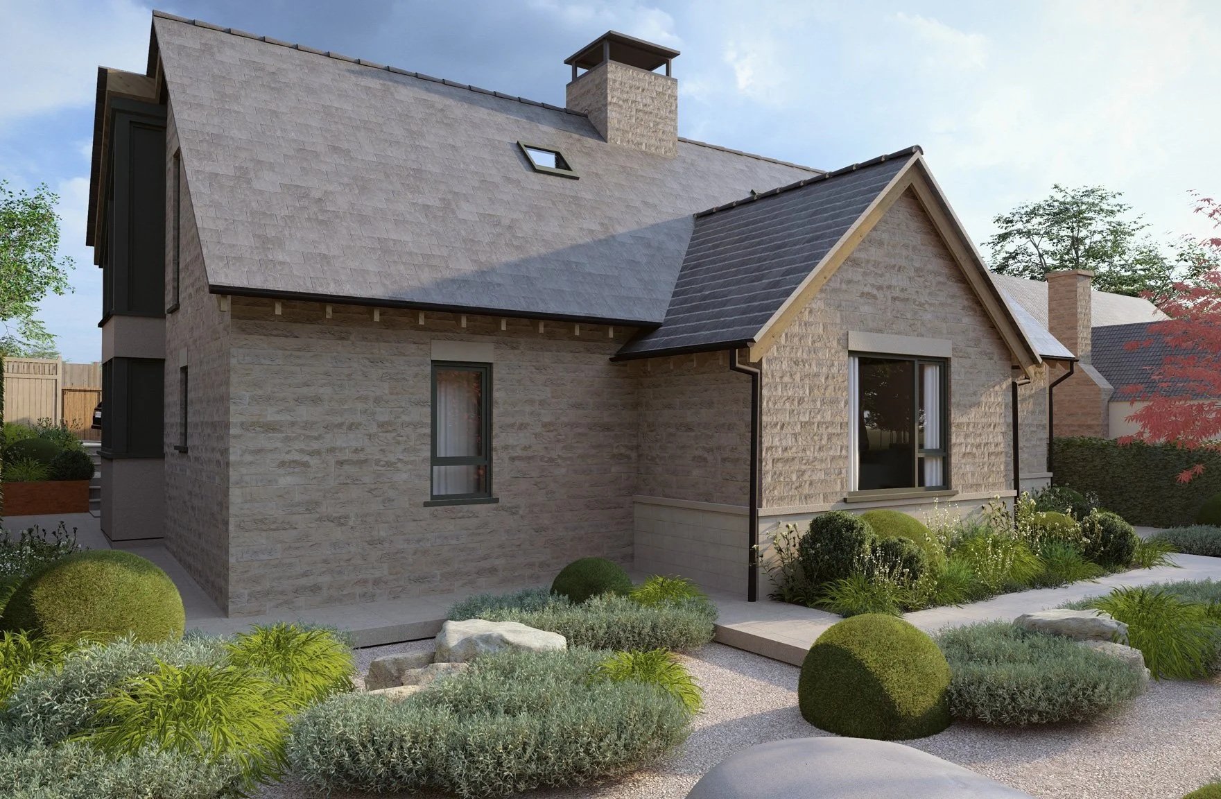 A modern two-story house with a gray shingle roof, stone exterior walls, and black framing around the windows. The house features a small front yard with neatly trimmed bushes, grass, and landscaping, and a sidewalk running along the front.