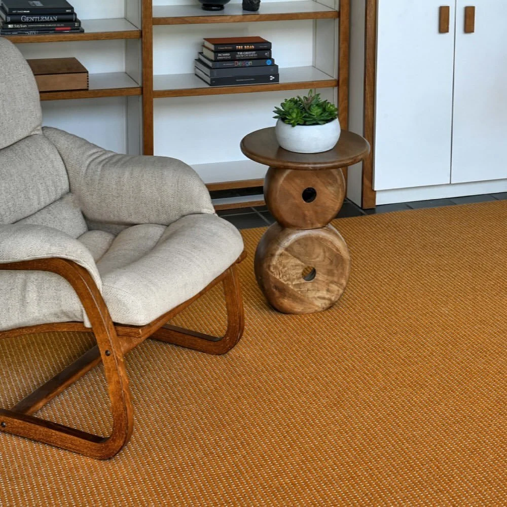 A layer of the La Salle rug from @scandecorugs in copper-toned New Zealand wool adds a refined warmth to the space &mdash; grounding it in texture, depth, and understated luxury. Its rich hue and natural fibers create an effortless balance between so