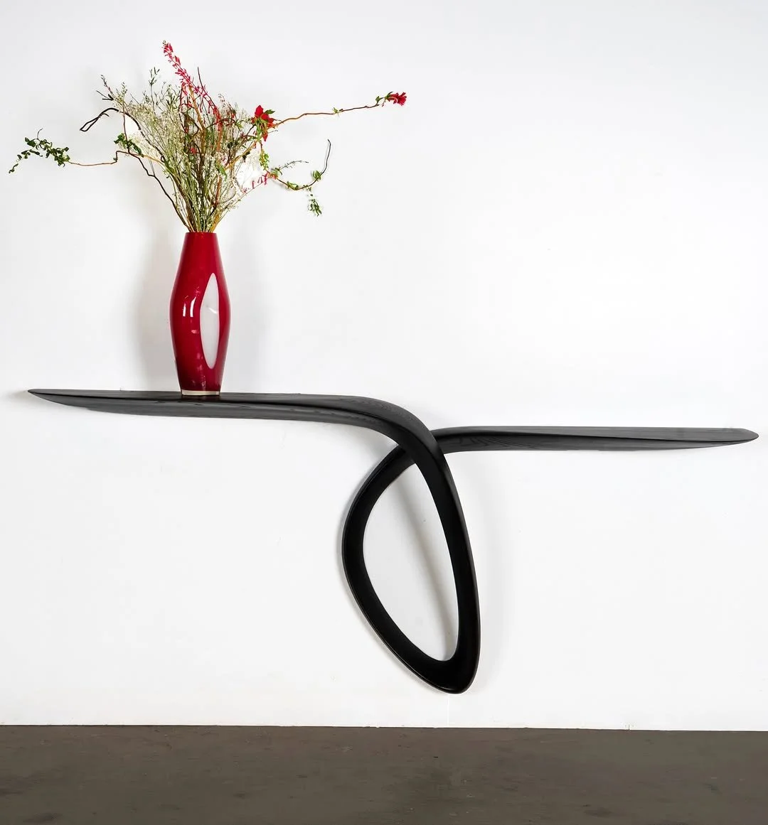 A custom expression of sculptural form and refined craftsmanship.

The Giv console table, created for @amykalikowdesign by @amorph_studio, brings a quietly architectural presence to the space. Defined by its clean silhouette and thoughtful proportion