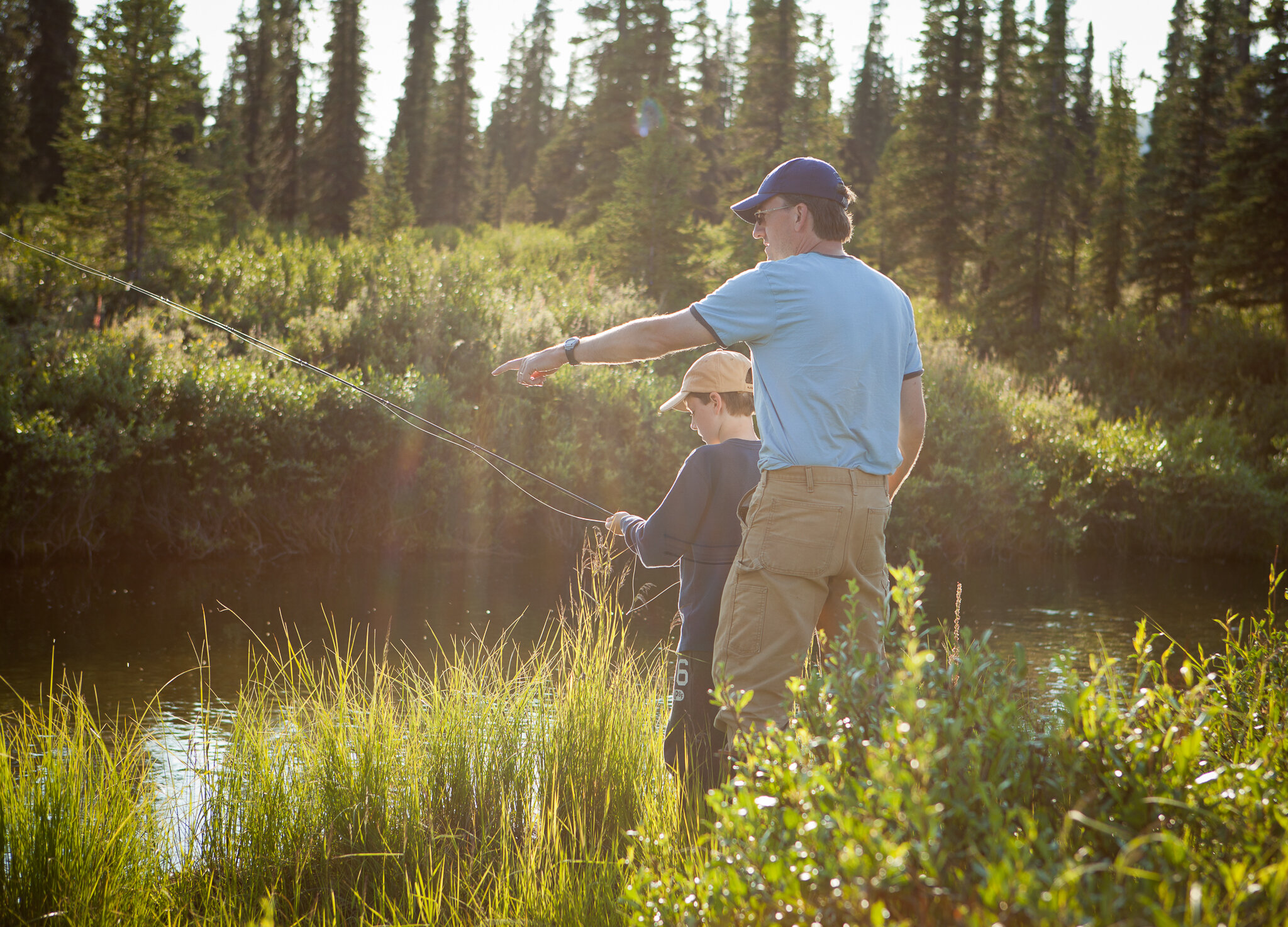 Denali Angler owner and Alaska registered guide with a young fly fisherman.