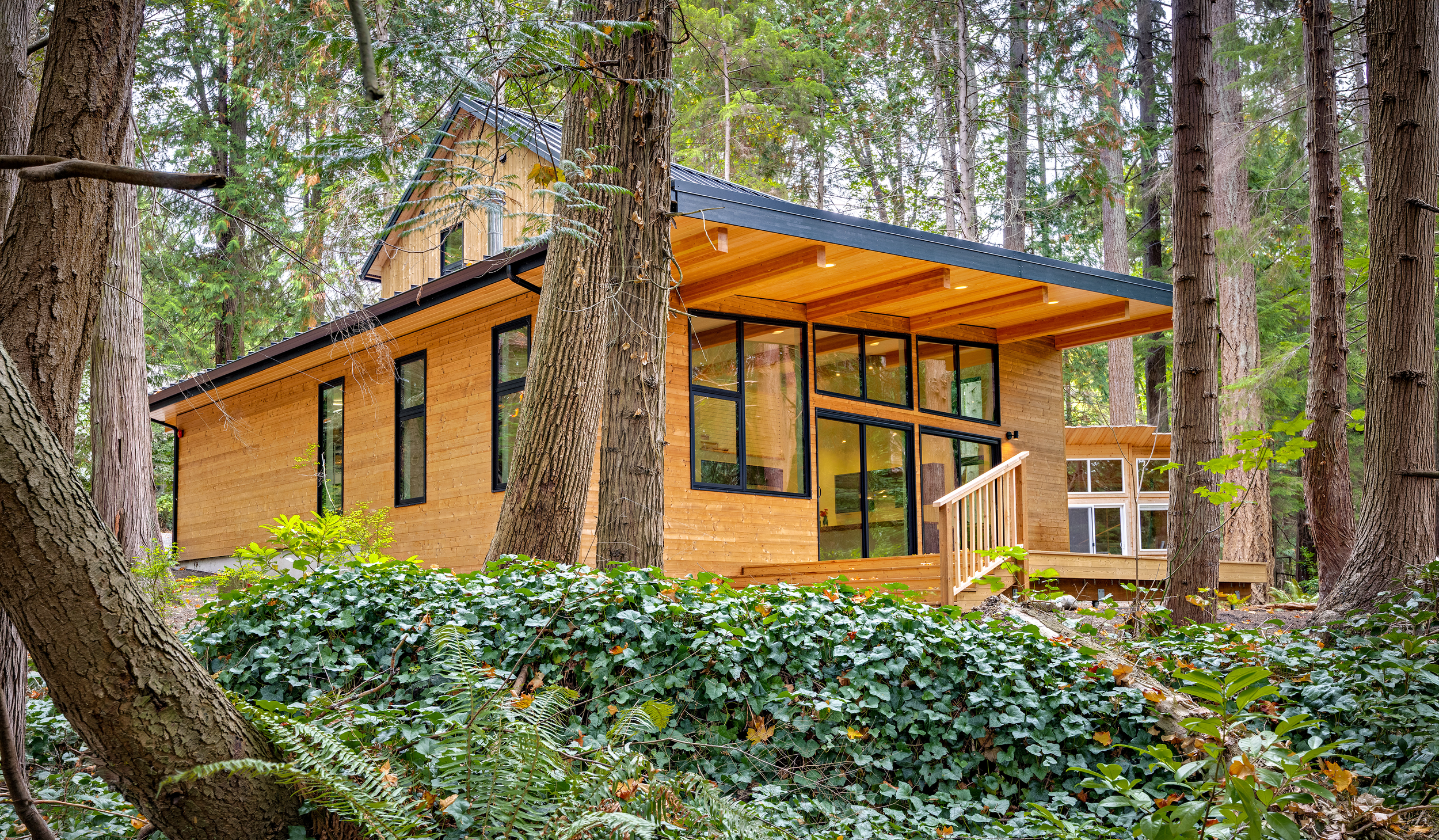 spotswood-architecture-design-indianola-custom-home-indianloa-washington-exterior-back.png
