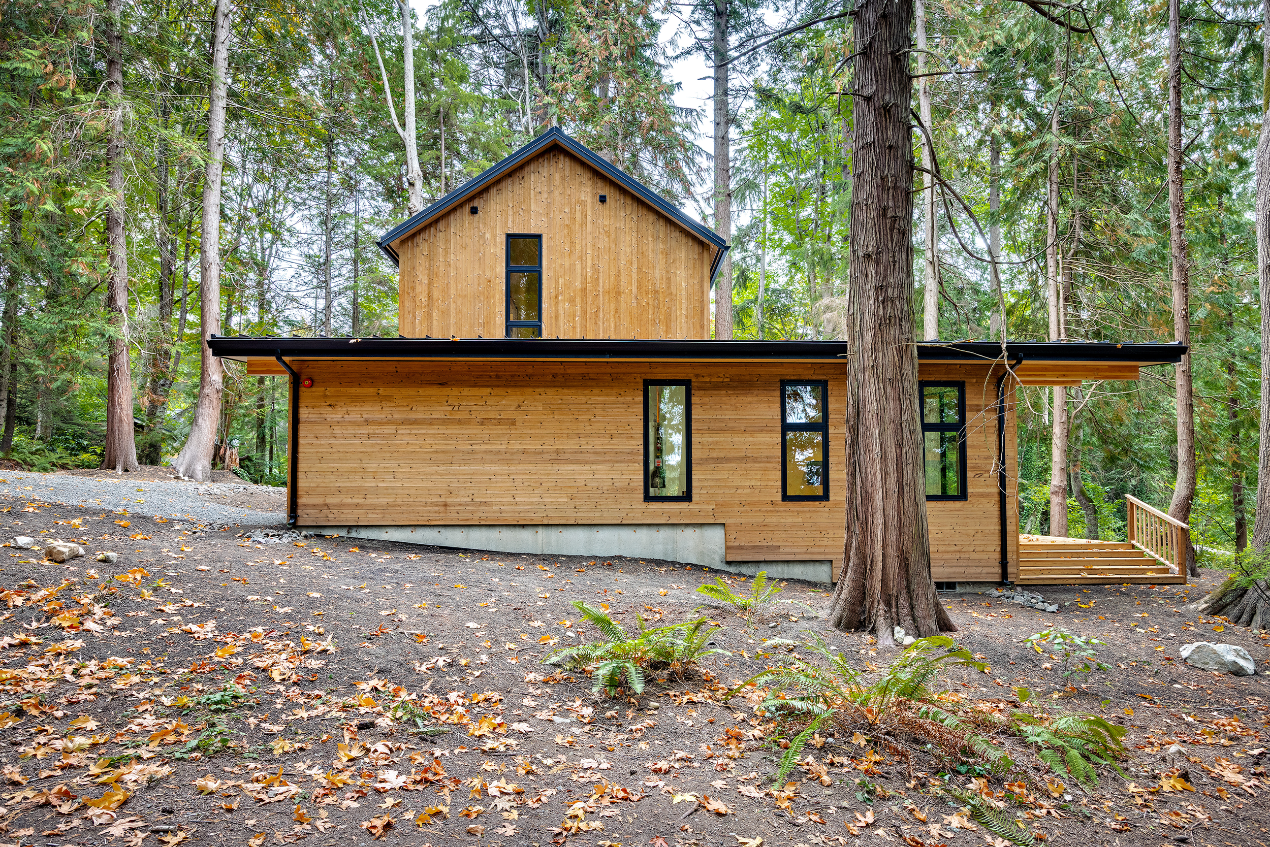 spotswood-architecture-design-indianola-custom-home-indianloa-washington-exterior-side.png