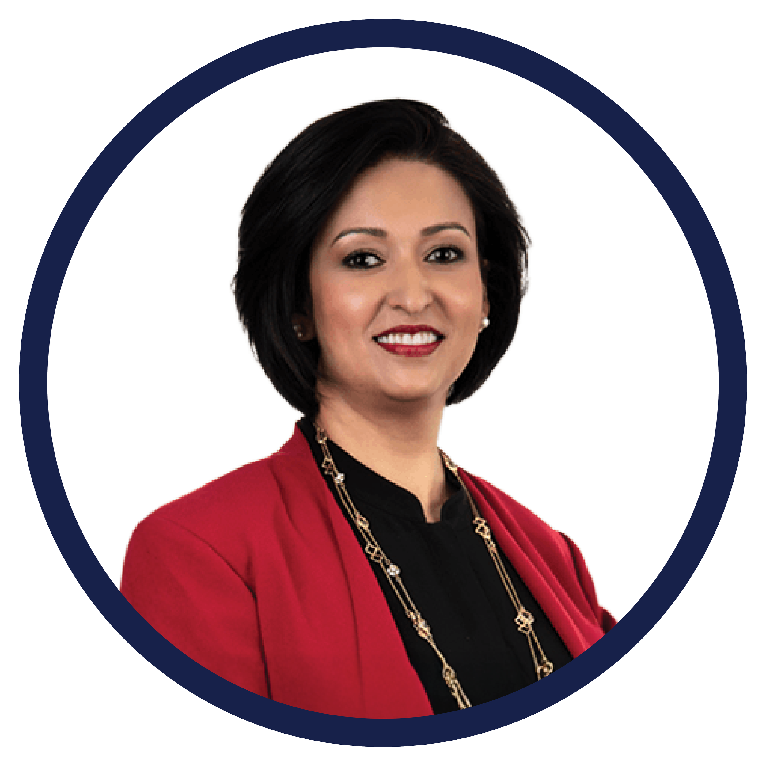 Professional woman with short black hair, wearing a black top, red blazer, and gold jewelry, smiling confidently.