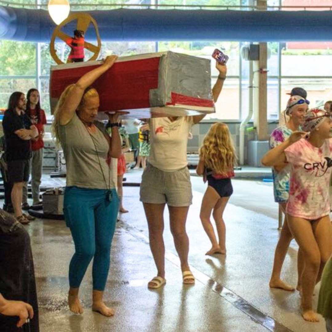 Julia with the Swim Team boat entry