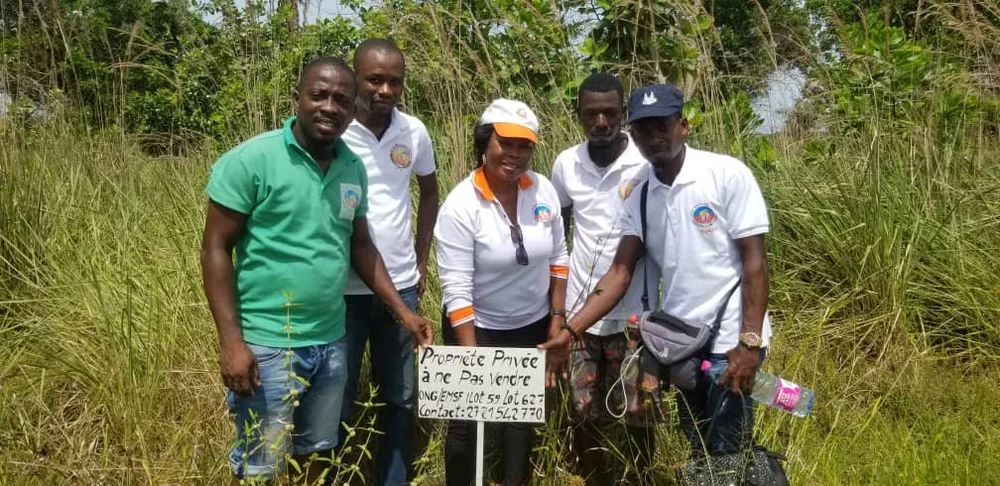 Posing with Sign #1.jpeg