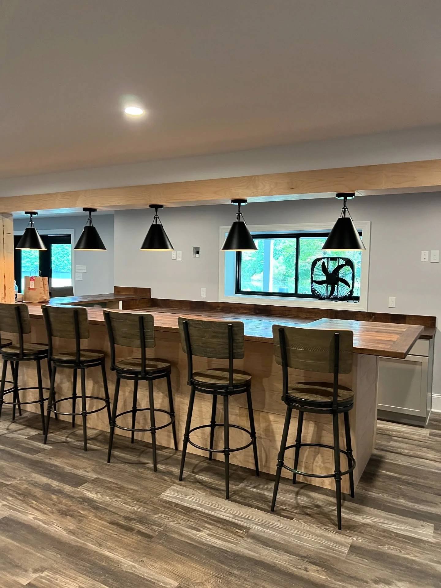 Reclaimed Chestnut Bar

Talk about a statement piece! We just finished installing a massive reclaimed chestnut bar top. This wood has history, character, and depth you simply can&rsquo;t buy off the shelf. Perfect for gathering, serving, and making m