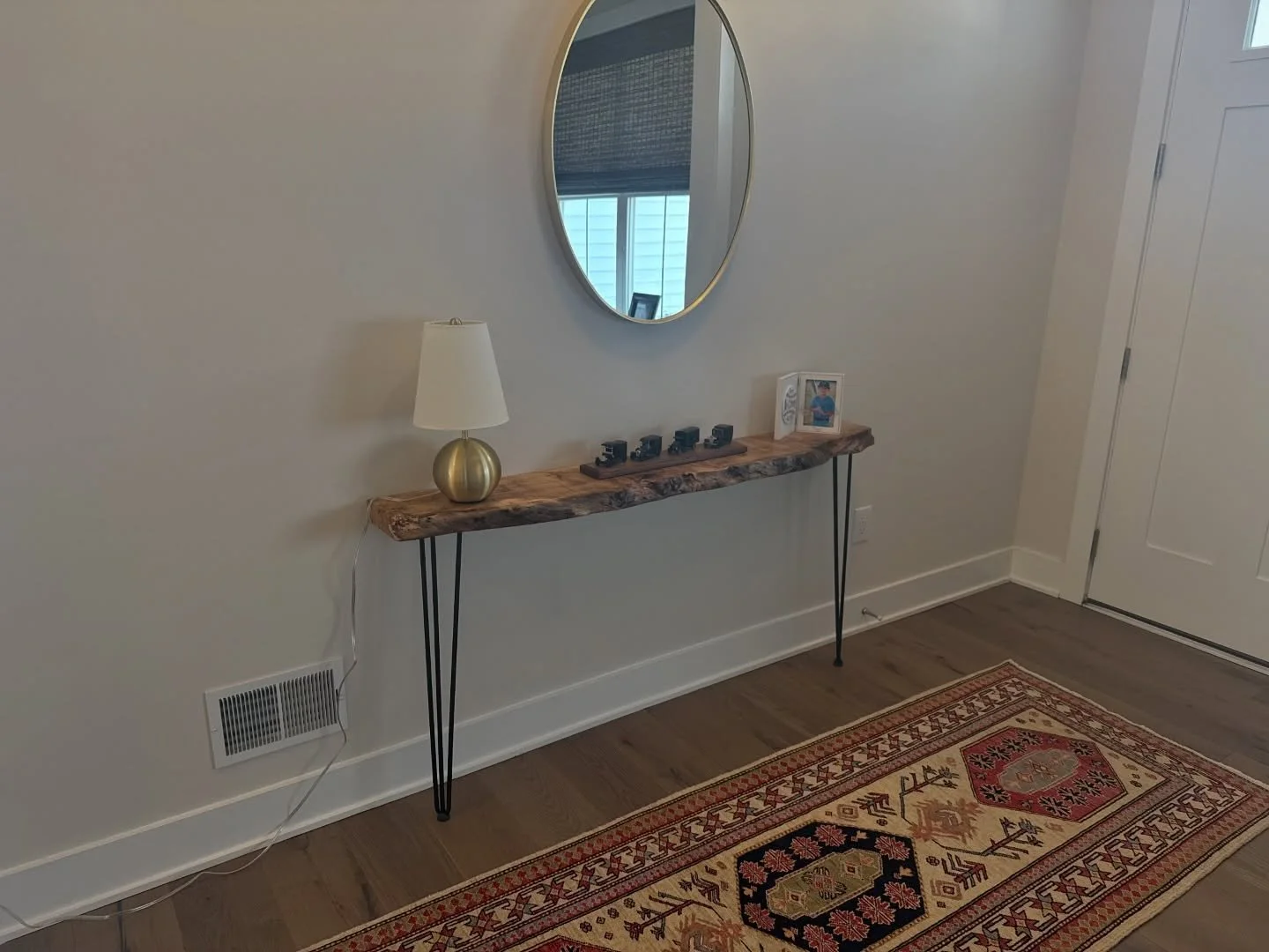 Welcome home! Here is a place for you to set the mail, your keys, charge your phone&hellip; it&rsquo;s a welcoming entry way! Spalted maple floating shelf with legs designed by the owner.