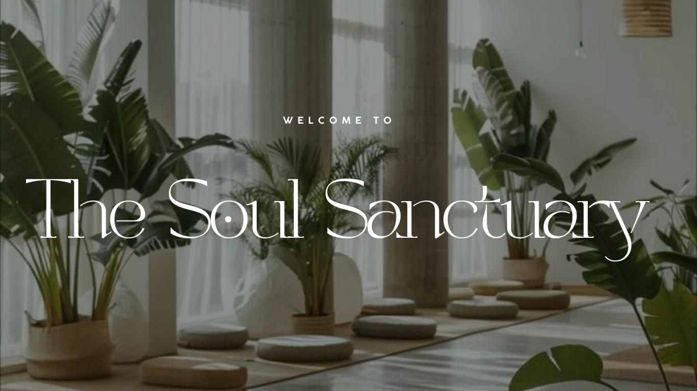 Interior of a wellness or meditation space with large potted plants, soft lighting, and cushions on the floor, welcoming visitors to The Soul Sanctuary.