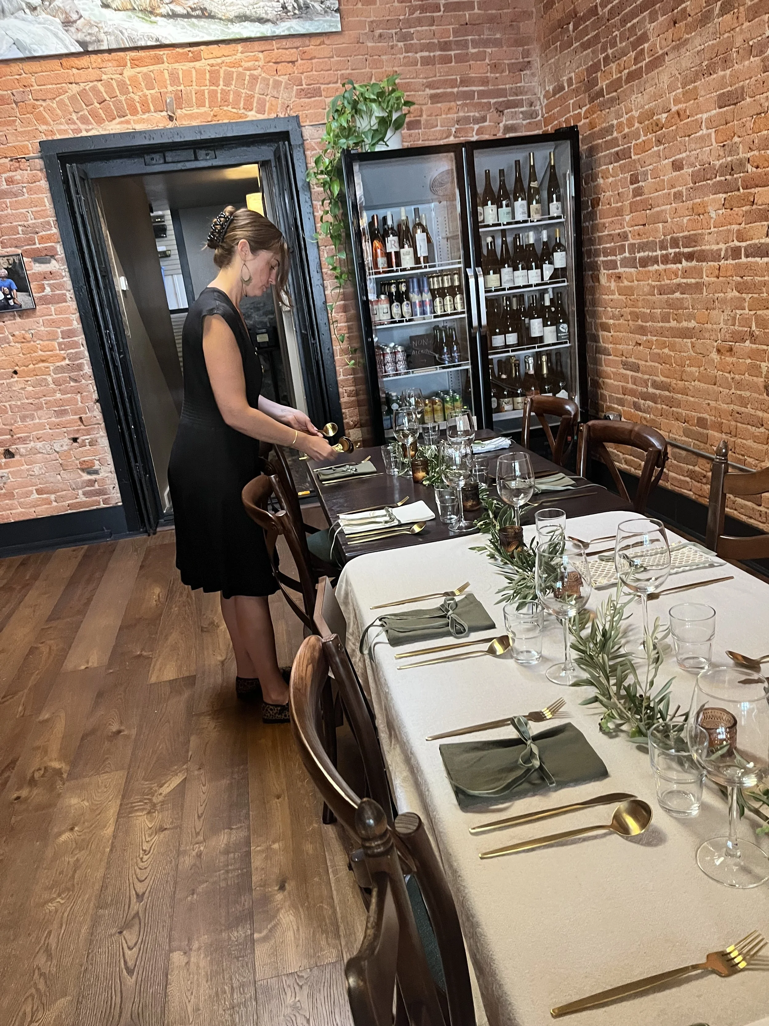 Setting the table for a wine dinner.