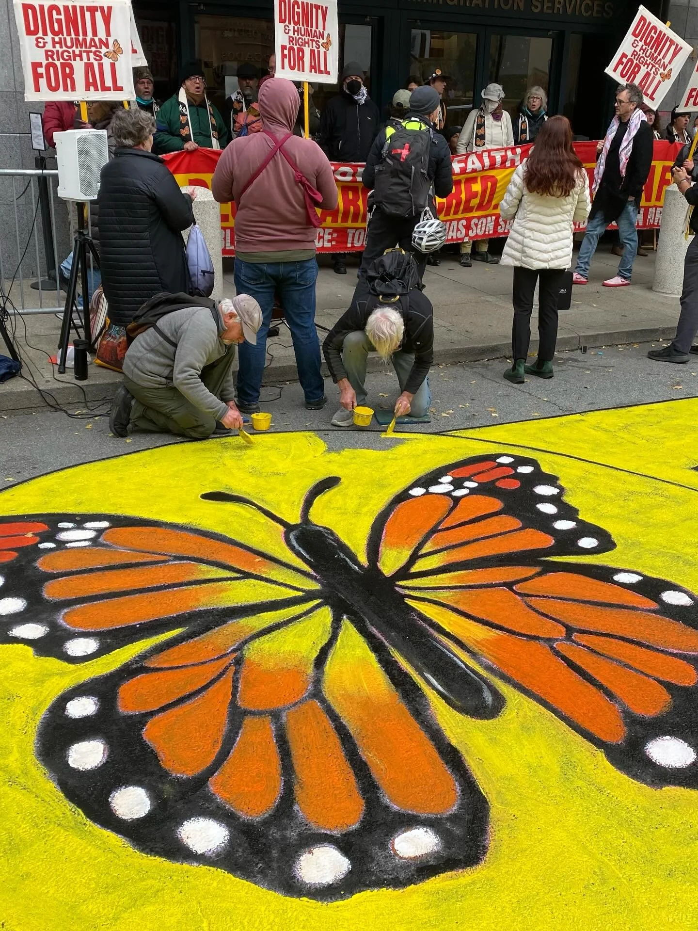 🦋 street mural painting as faith leaders shut down the ICE field office in SF. @davidsolnit
@im4humanintegrity @bayresistance &ldquo;our faiths teach us: love thy neighbor and disrupt injustice&rdquo;