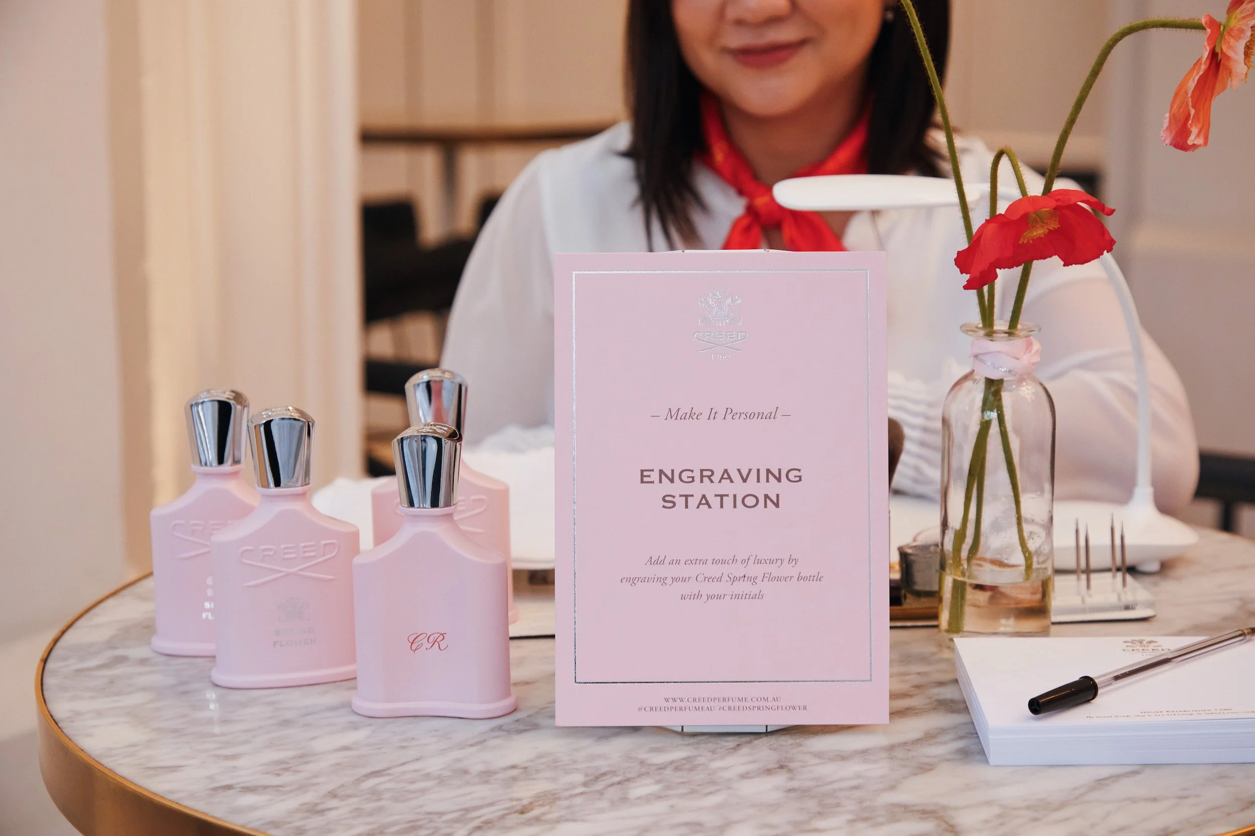 Creed Spring Flower Live Activation Engraving Station.JPG