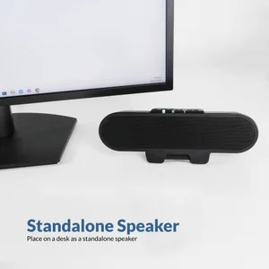 CA-2890PRO Bluetooth speakerphone speaker bar standing on a desk in front of a PC monitor