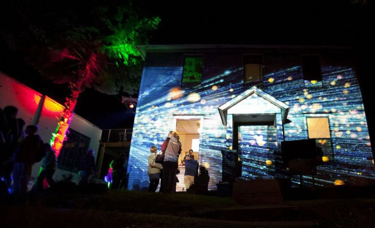 ArtPrize-goers look at Kronschlaeger + Amenta Lott's entry "HYBRID STRUCTURES" as part of the SiTE:LAB Rumsey St. Project in Grand Rapids on Saturday, Sept. 24, 2016. Kronschlaeger Amenta Lott is made up of artists Alois Kronschlaeger, Paul Amenta an