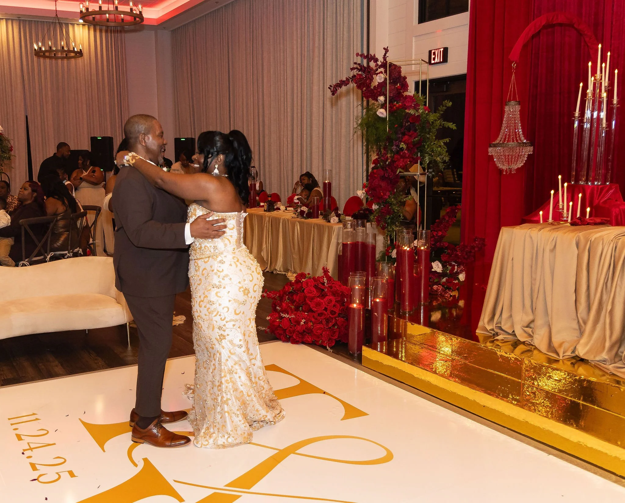 Red and gold wedding reception in Lagrange, GA at Oakfuskee Conservation Center