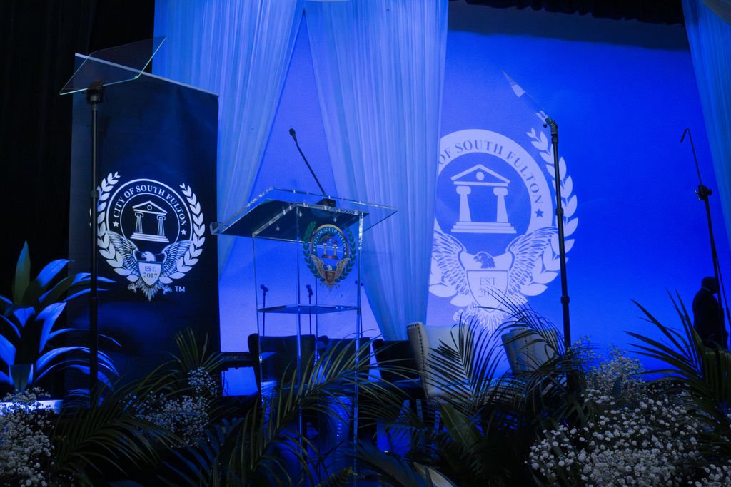 Stage greenery arrangements for the City of South Fulton Swearing In Ceremony 