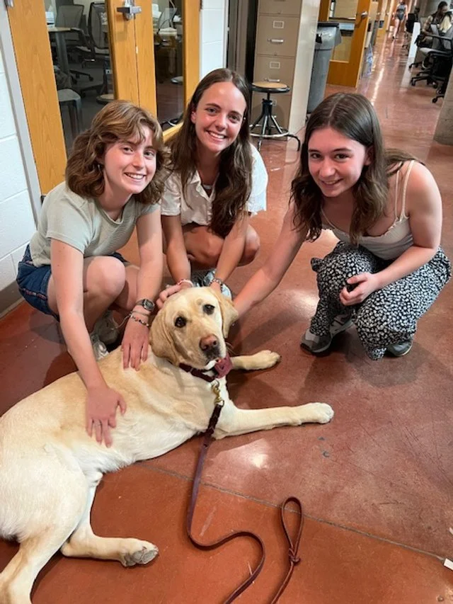 Facility dog Aiden with Virginia Tech design students