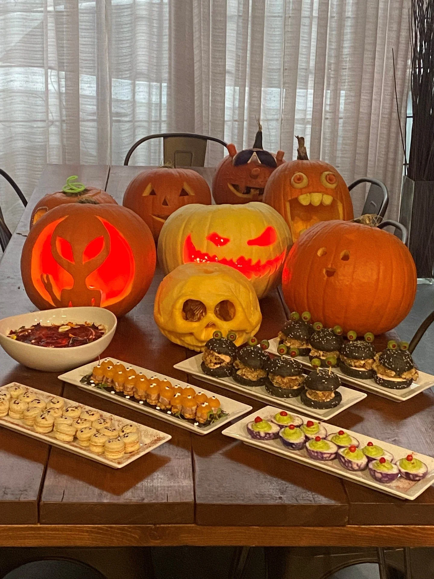 Happy Hallo-weekend from the team at Peake! 🎃⁠
⁠
We had a little fun putting our pumpkin carving skills to the test, and of course, there were some incredibly delish (and very on-theme) bites involved! 🧡 How did we do?!⁠
⁠
#PeakeCatering
