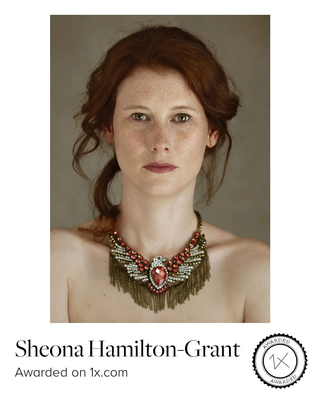 1x Award for portrait of beautiful woman with green eyes and deep ginger hair