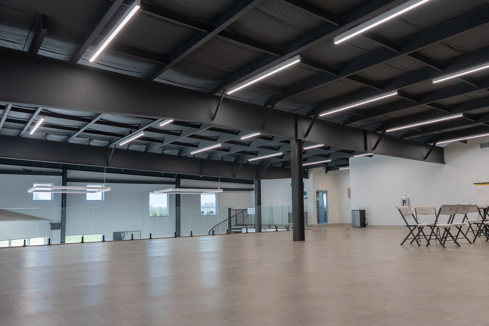  Valley Roofing warehouse interior showing open layout and Butler pre-engineered steel framing 