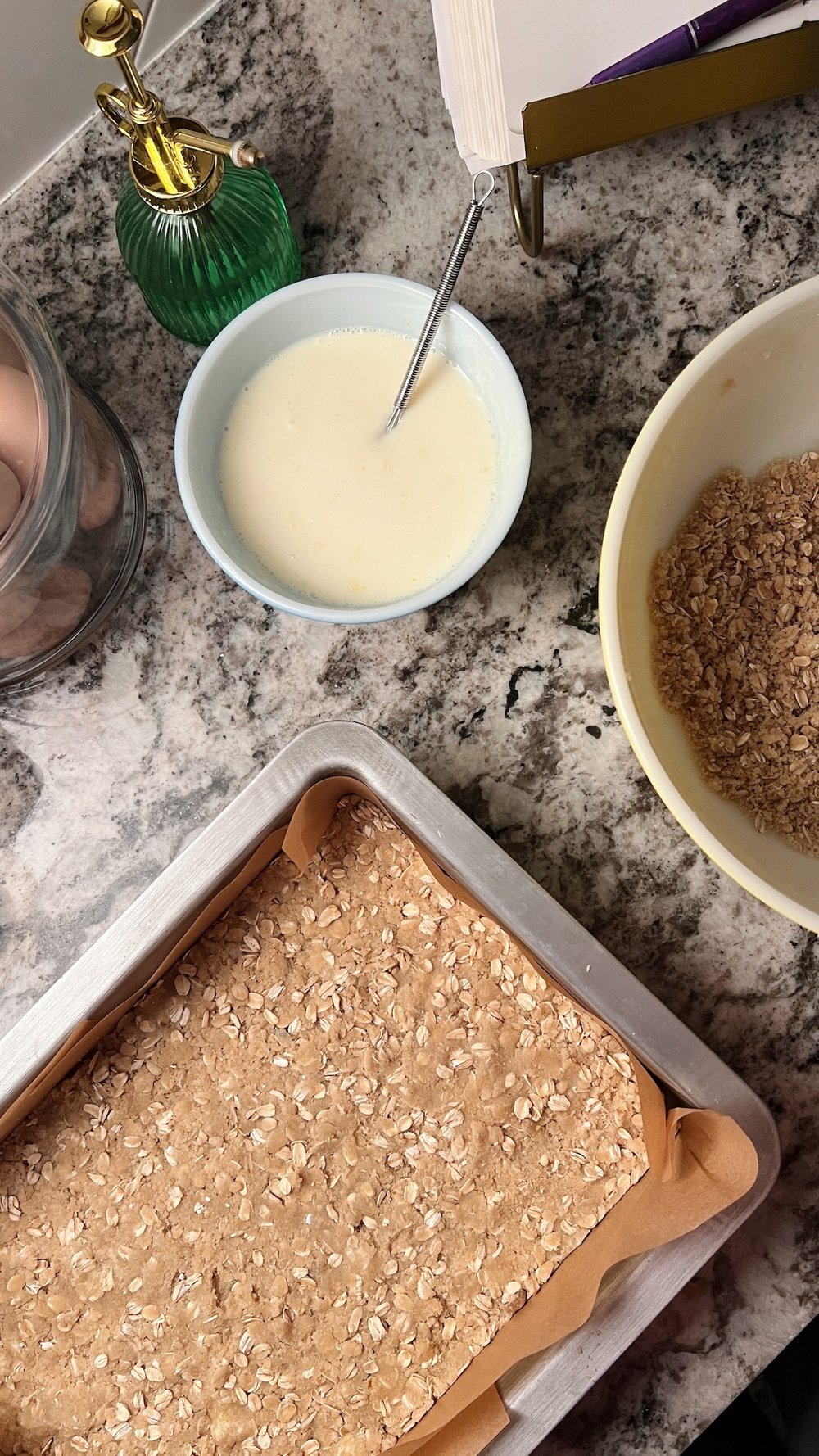 Press 1/2 of crumble into bottom of pan