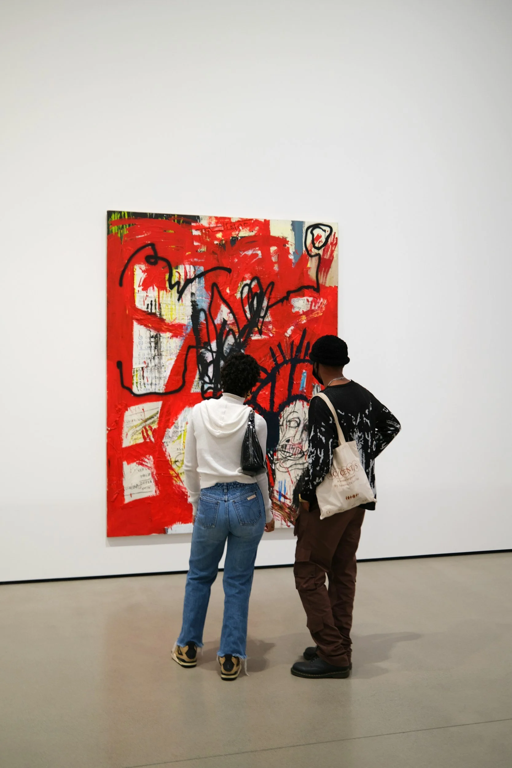 Young couple viewing art
