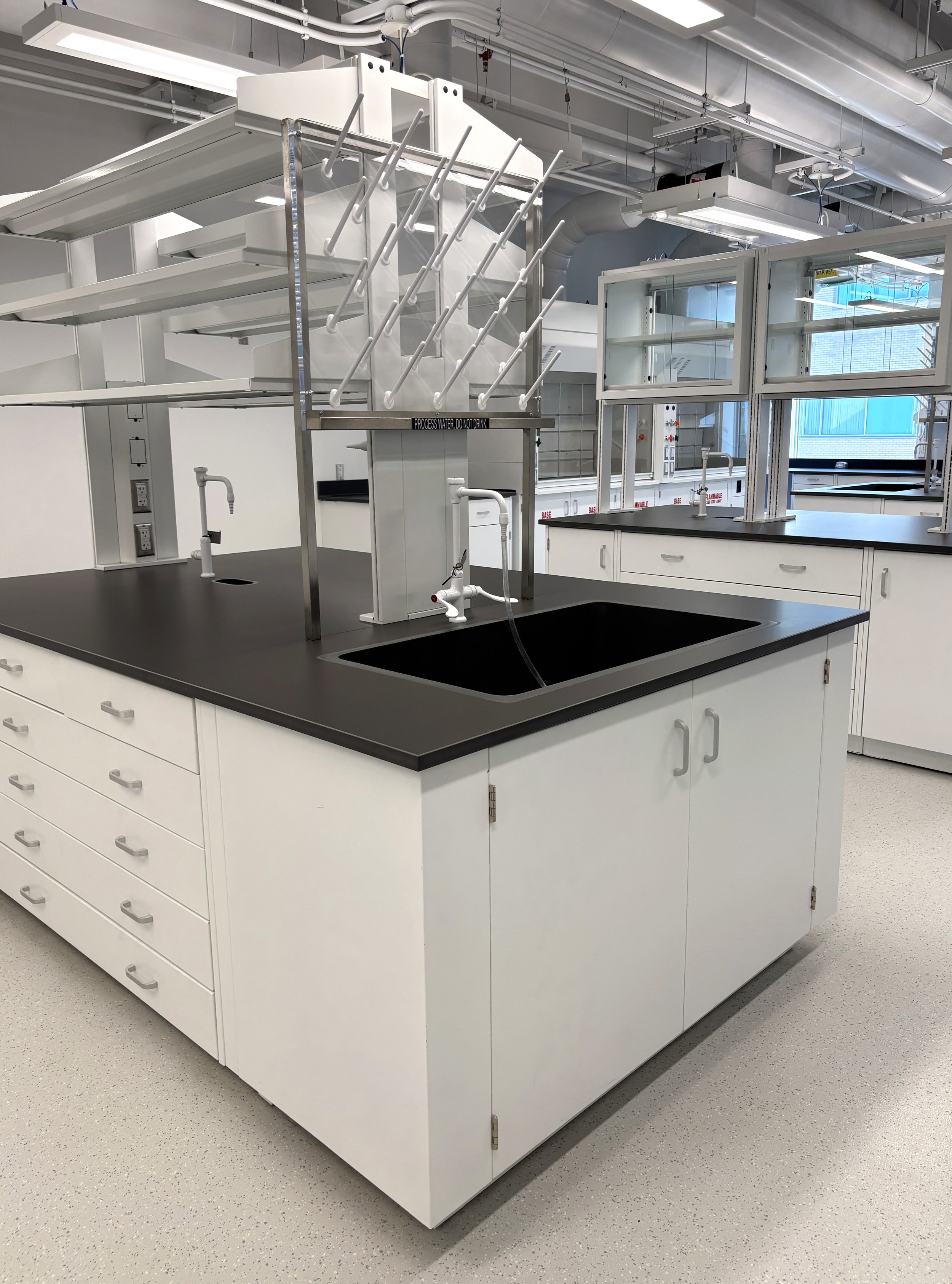 painted steel casework with benchtop shelving, in a lab