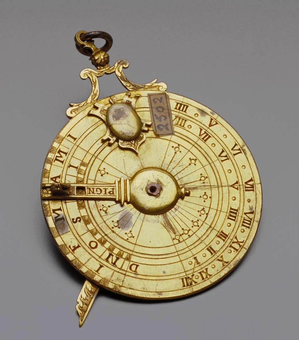 Nocturnal, French, ca.1600 Dial consisting of a disk engraved on both sides. The recto bears markings for the zodiac signs, months, and days. On it rotates a circle divided into 29 parts and carrying two indexes; on this circle is a small rotating d…