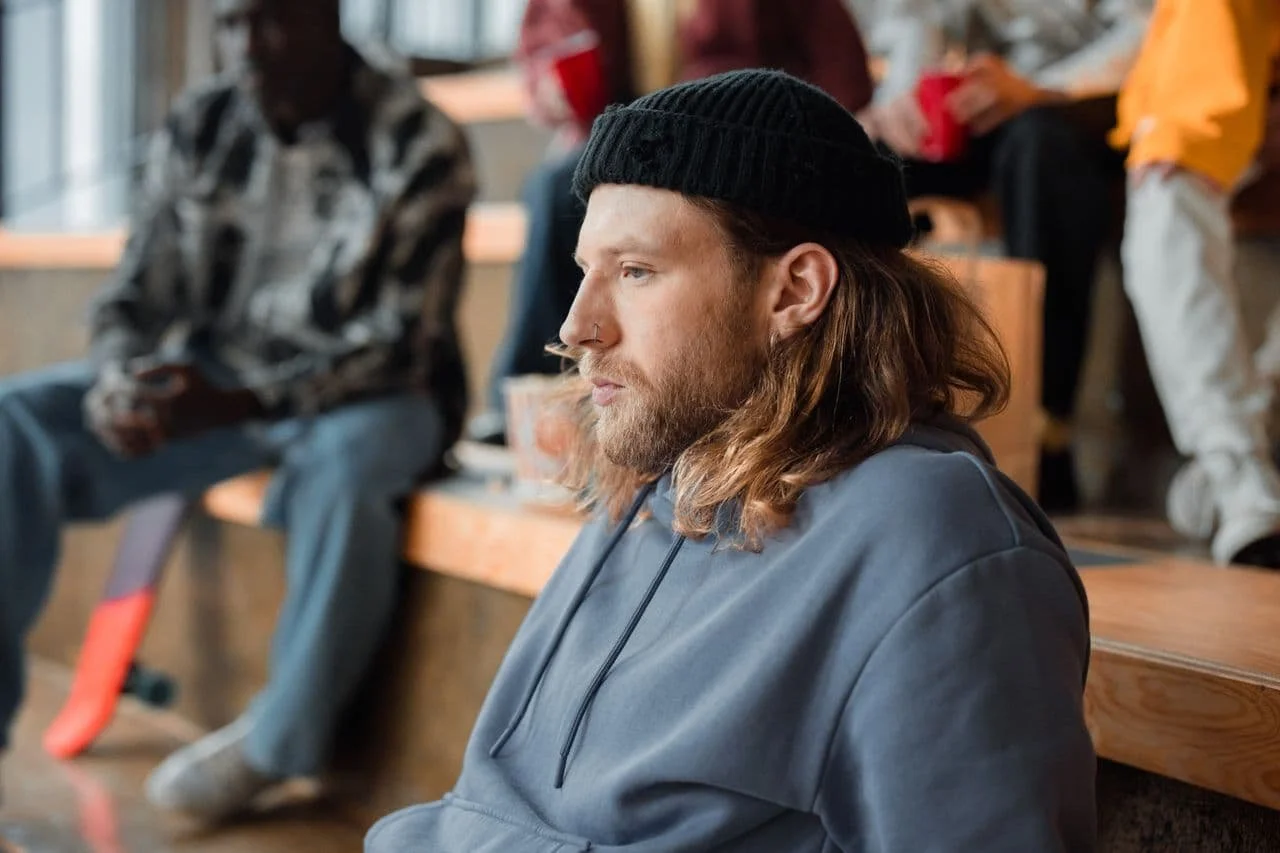 side-view-of-a-man-with-facial-hair-wearing-a-black-beanie