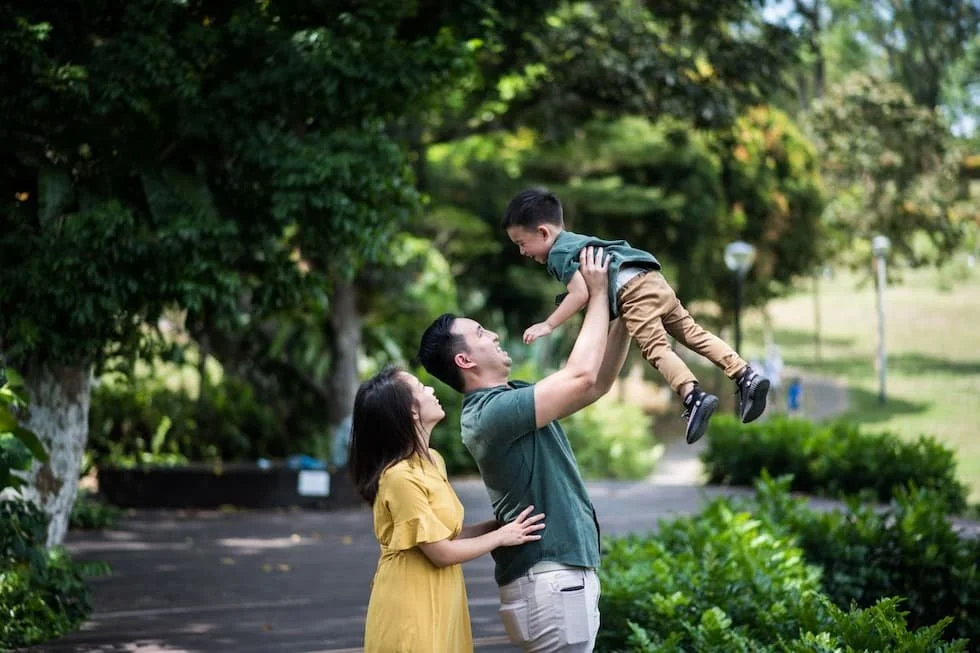 happy-family-playing-outdoors-in-bright-park