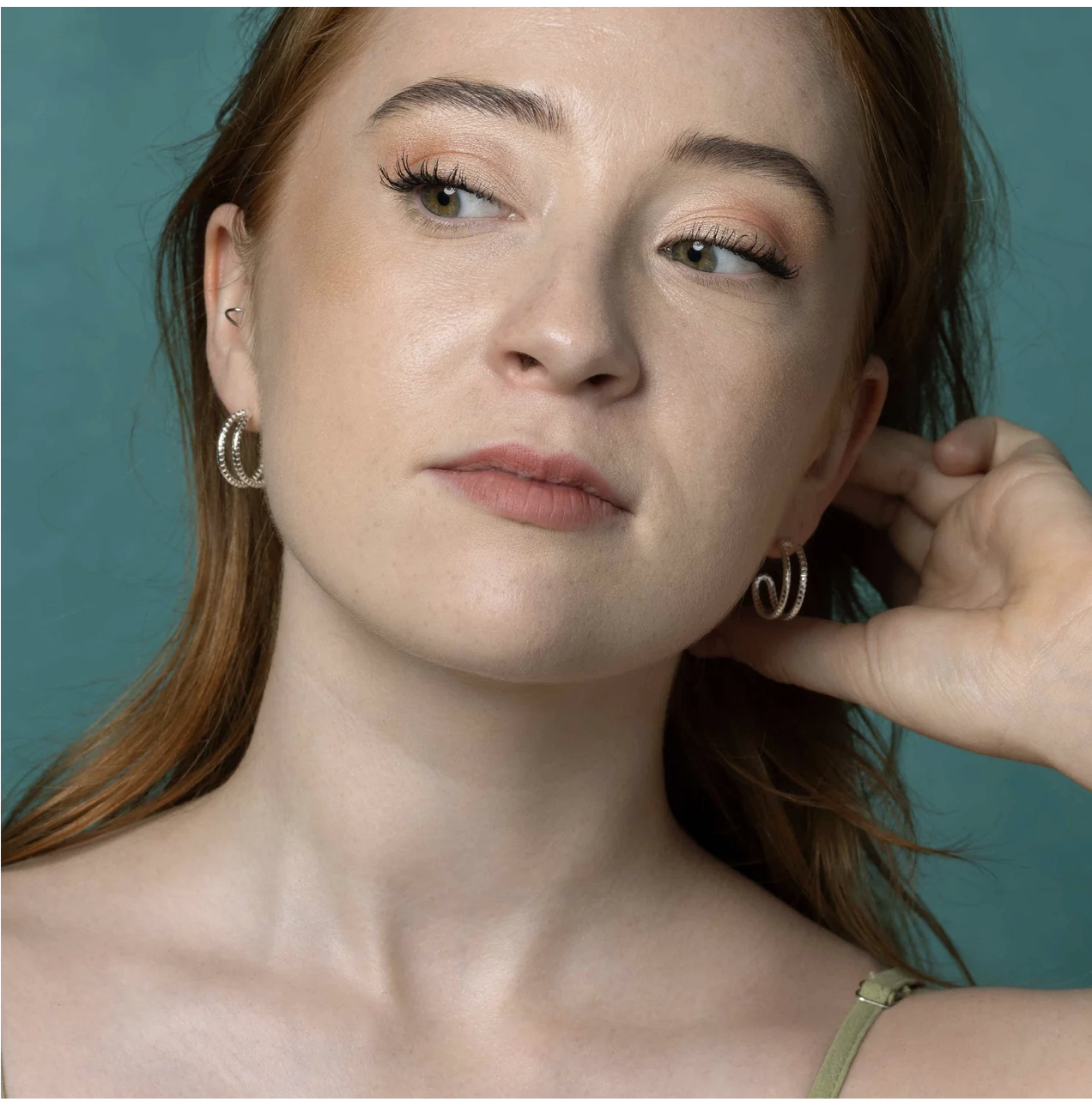 Serpentine Medium Hoops In Silver on model 2.png