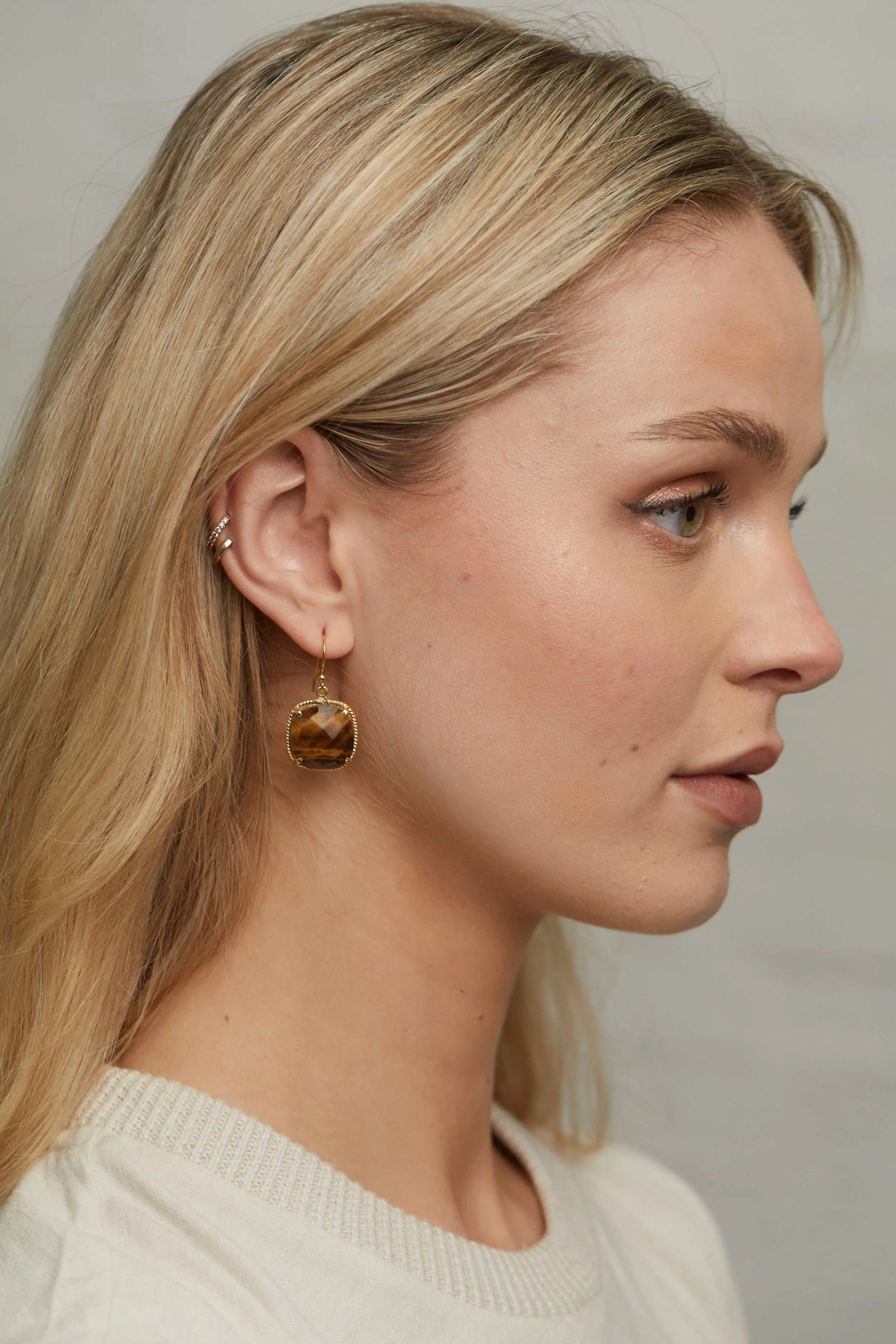 Yellow Tigers Eye Cushion ER on Model.jpg
