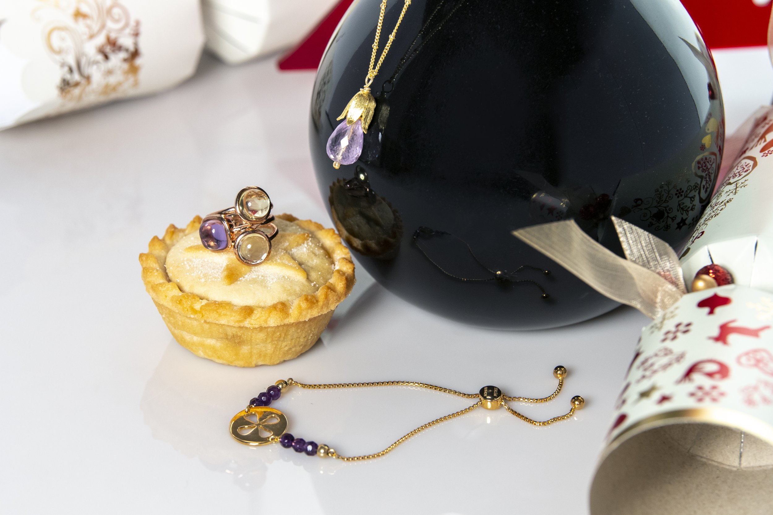 Ametrine PE and Ring and Symbol BR on Blk Vase.jpg