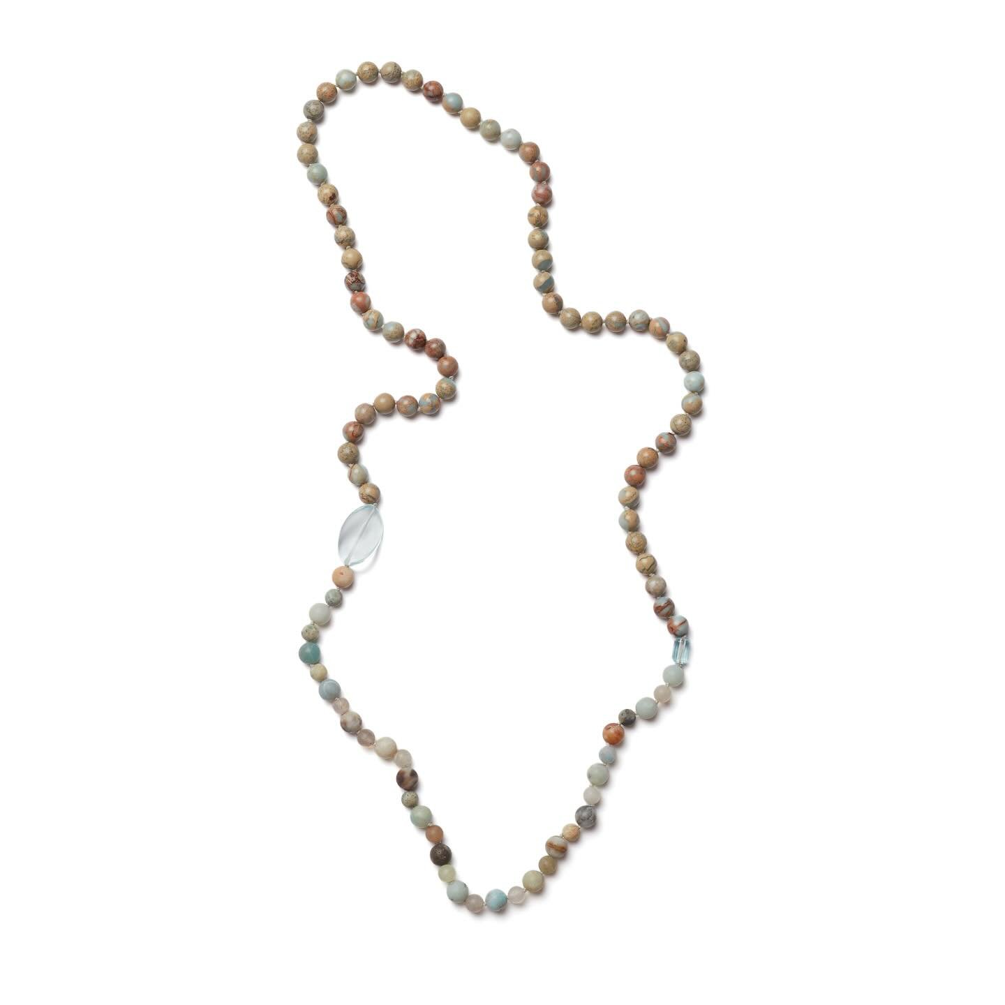 ☀️ Summer jewellery makes all the difference to your outfit. 
This stunning hand-knotted rope necklace blends the calming hues of matte Amazonite and Aqua Terra Jasper gemstones with laser-cut aquamarine.
.
.
.
#jasper #aquamarine#necklace #gemstones