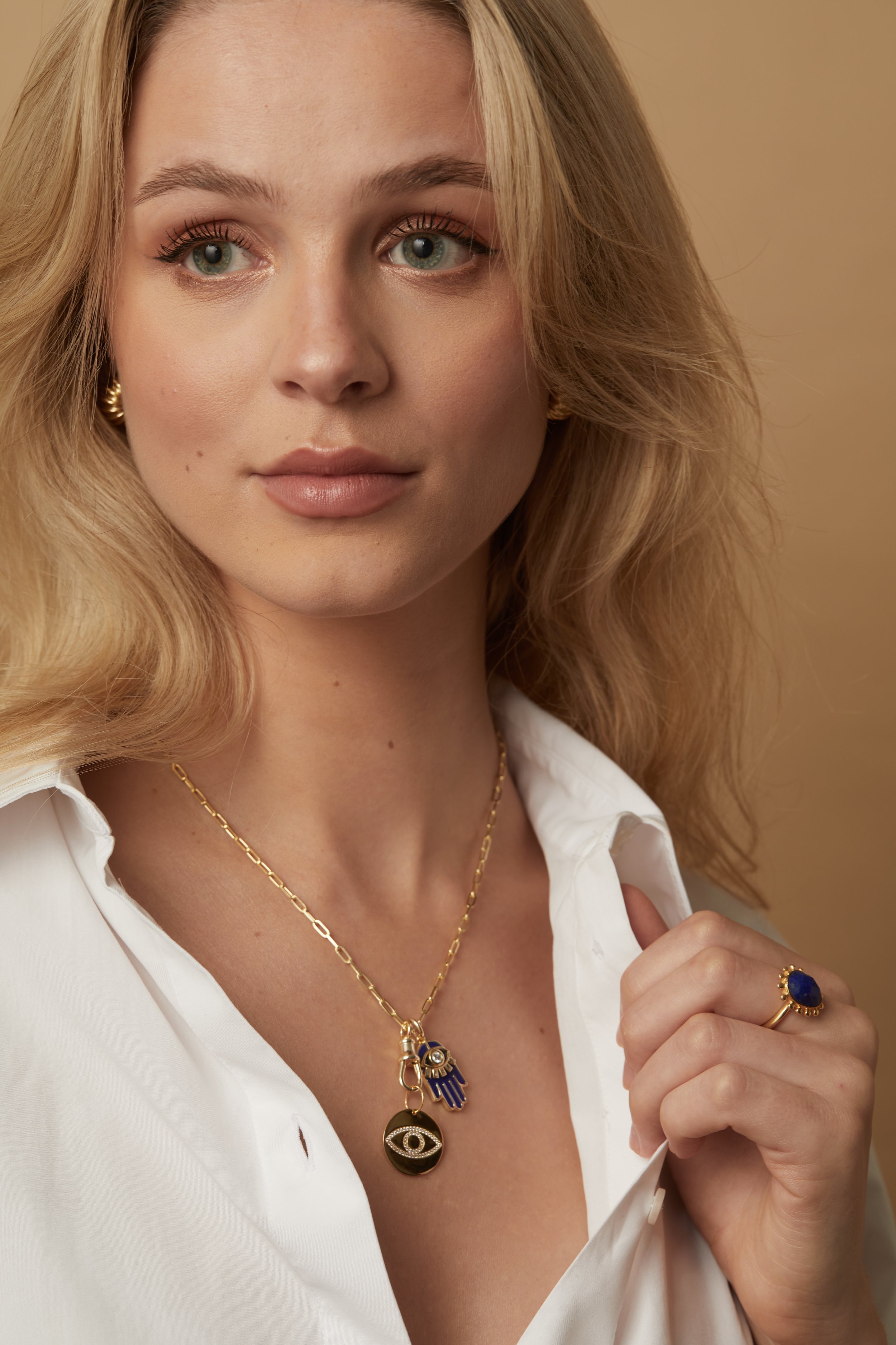 Hamsa NK and Lapis Ring on model.jpg