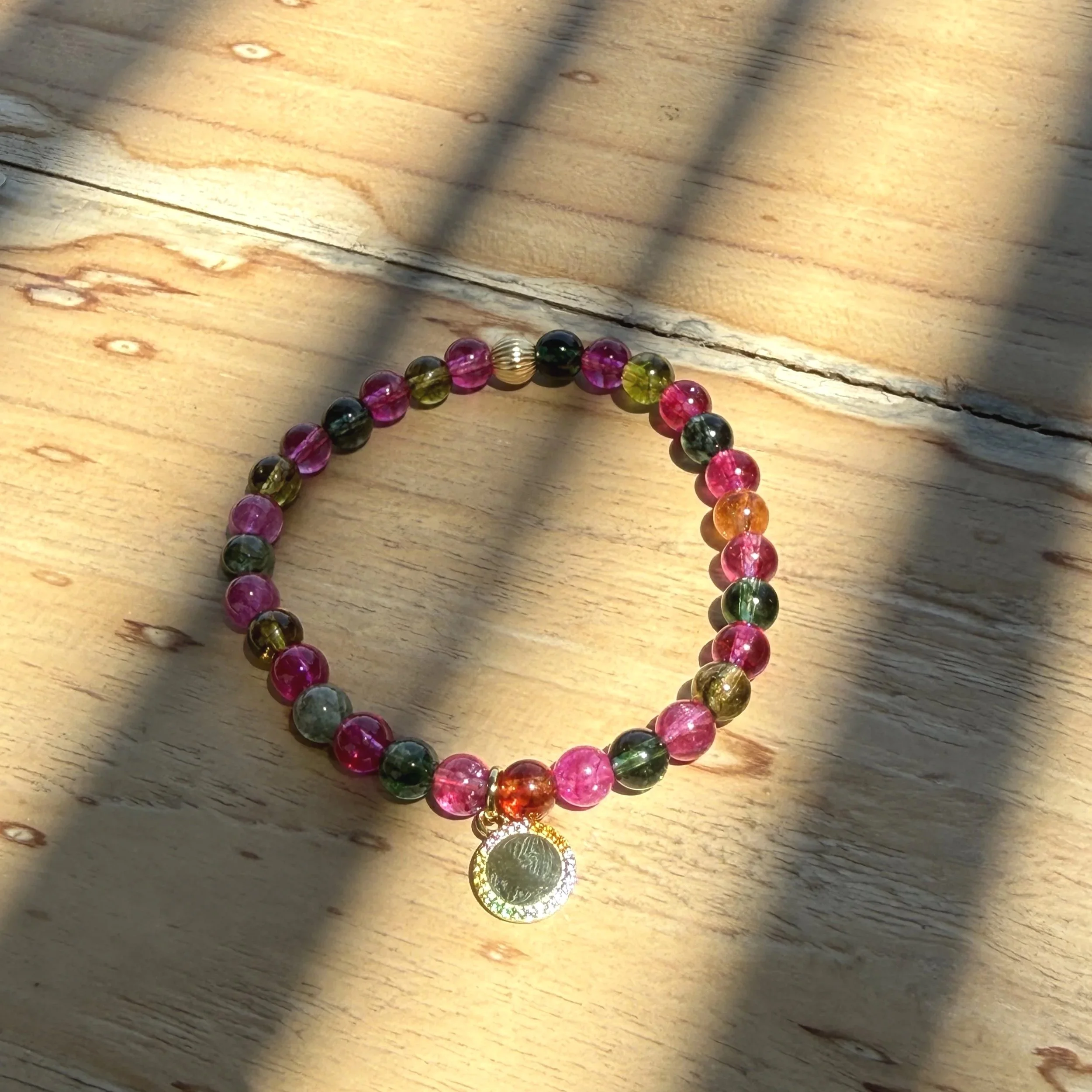 Pink+Tourmaline+BR+with+Rainbow+Charm.jpg