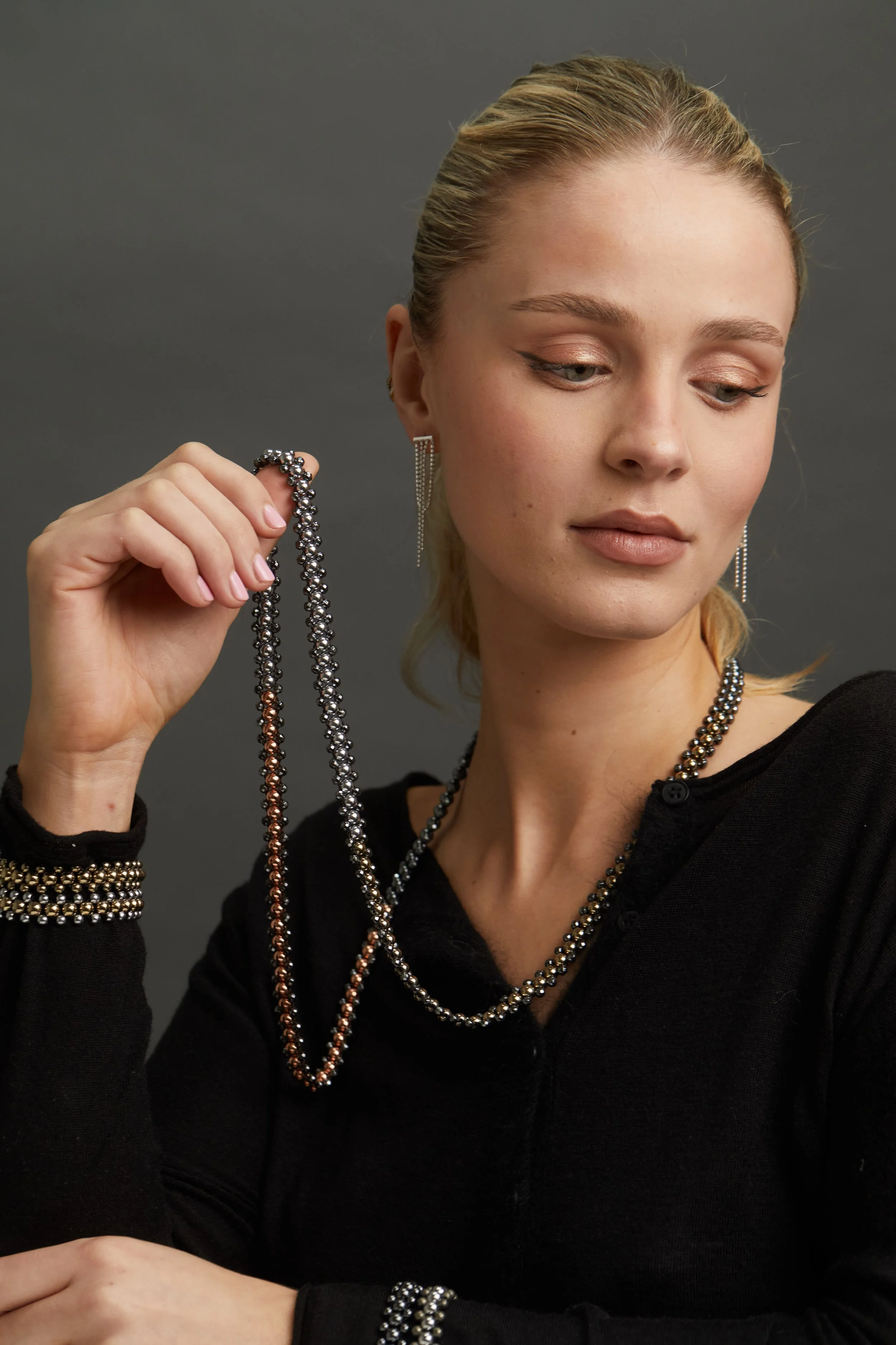 Zip Necklace and mini zip cuffs on model.jpg
