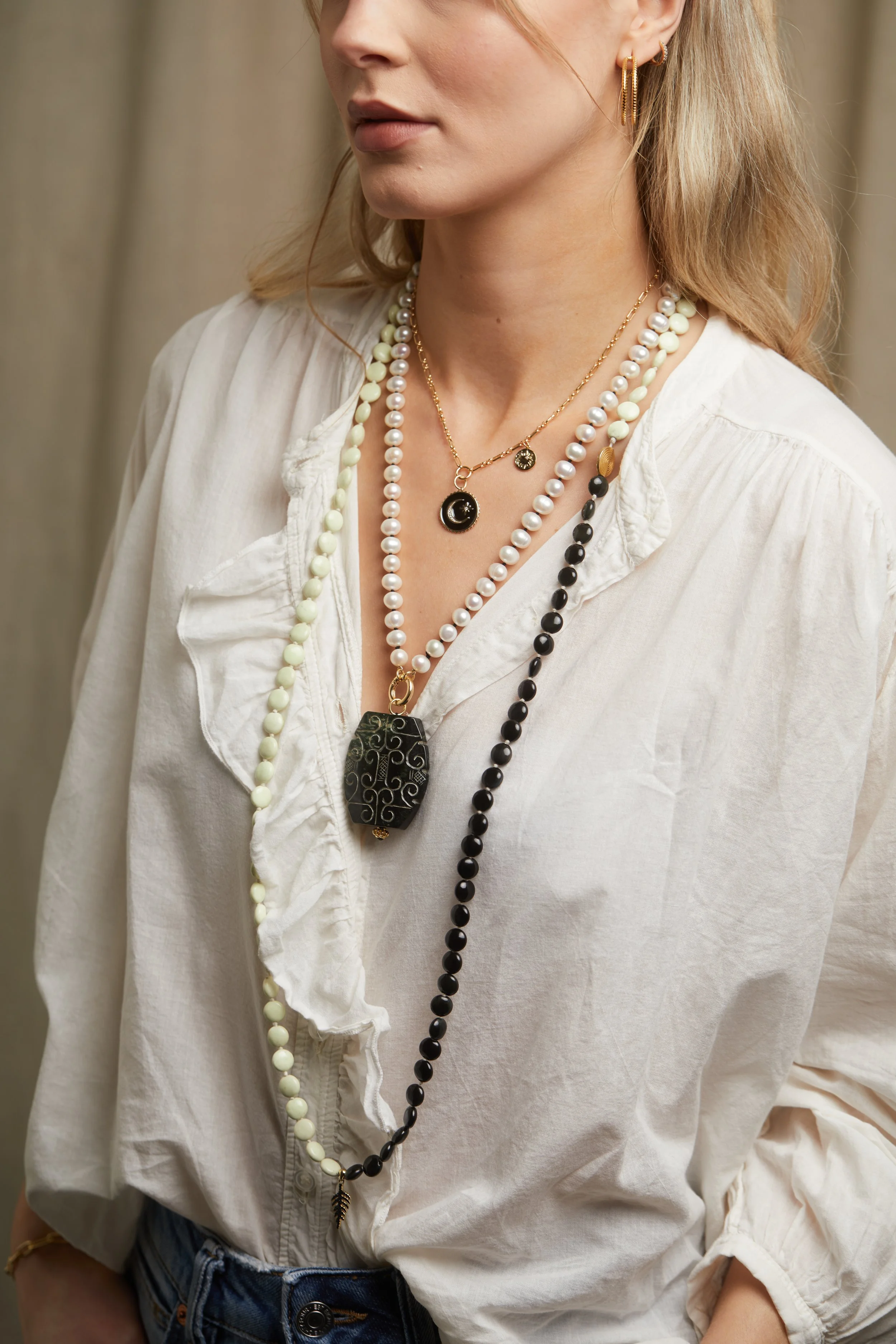 Pearl with Carved Stone PE with Black Cleste and Palm Noir close up cropped.jpg