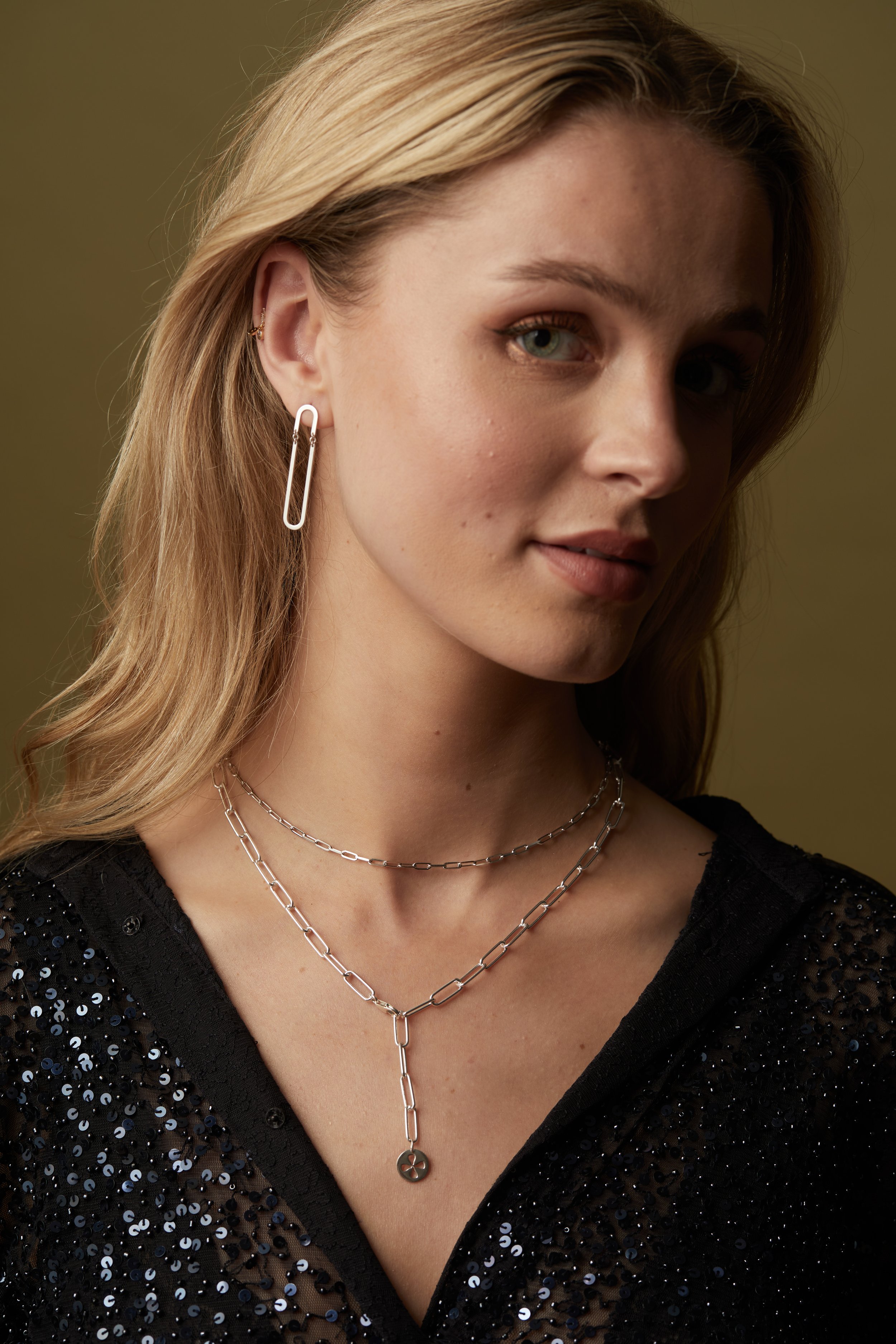 Silver Symbol Paper Clip Nk and Hinged ER on model.jpg