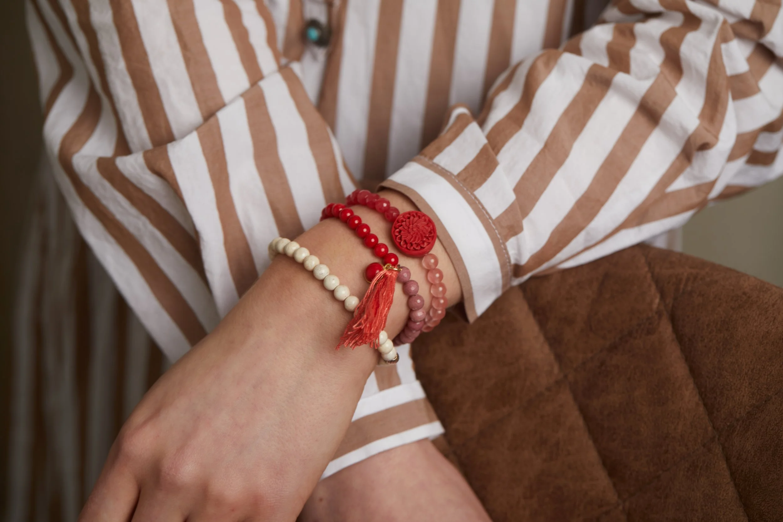 Red Tassel on Hand.jpg