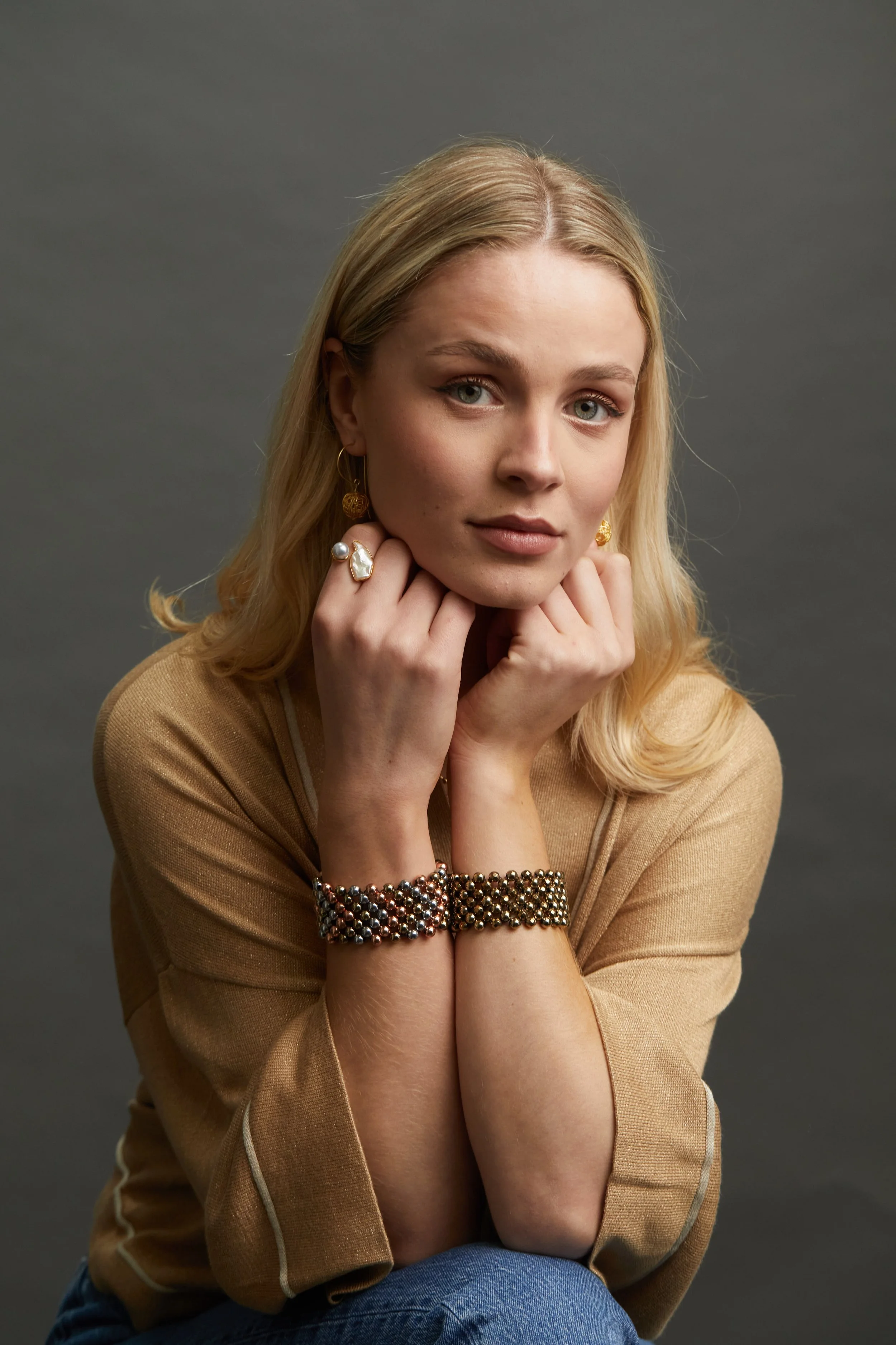 Zip Cuffs and Pearl Ring on model.jpg