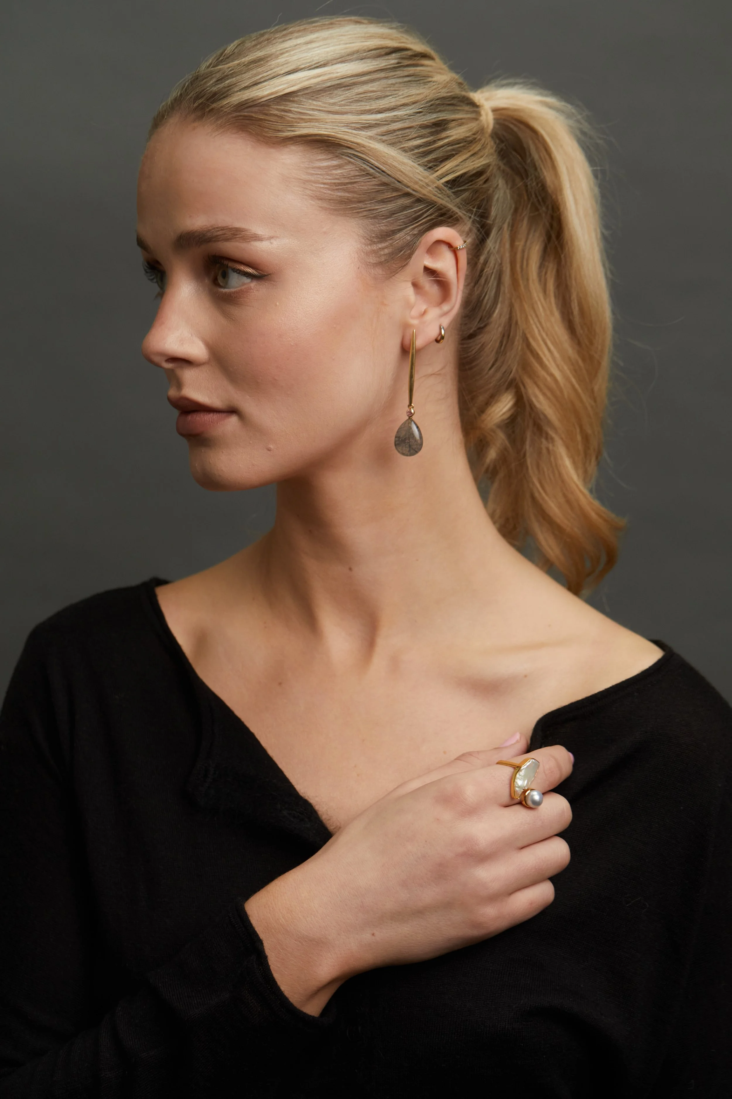 Elongated Grey Er and Pearl Ring on model.jpg