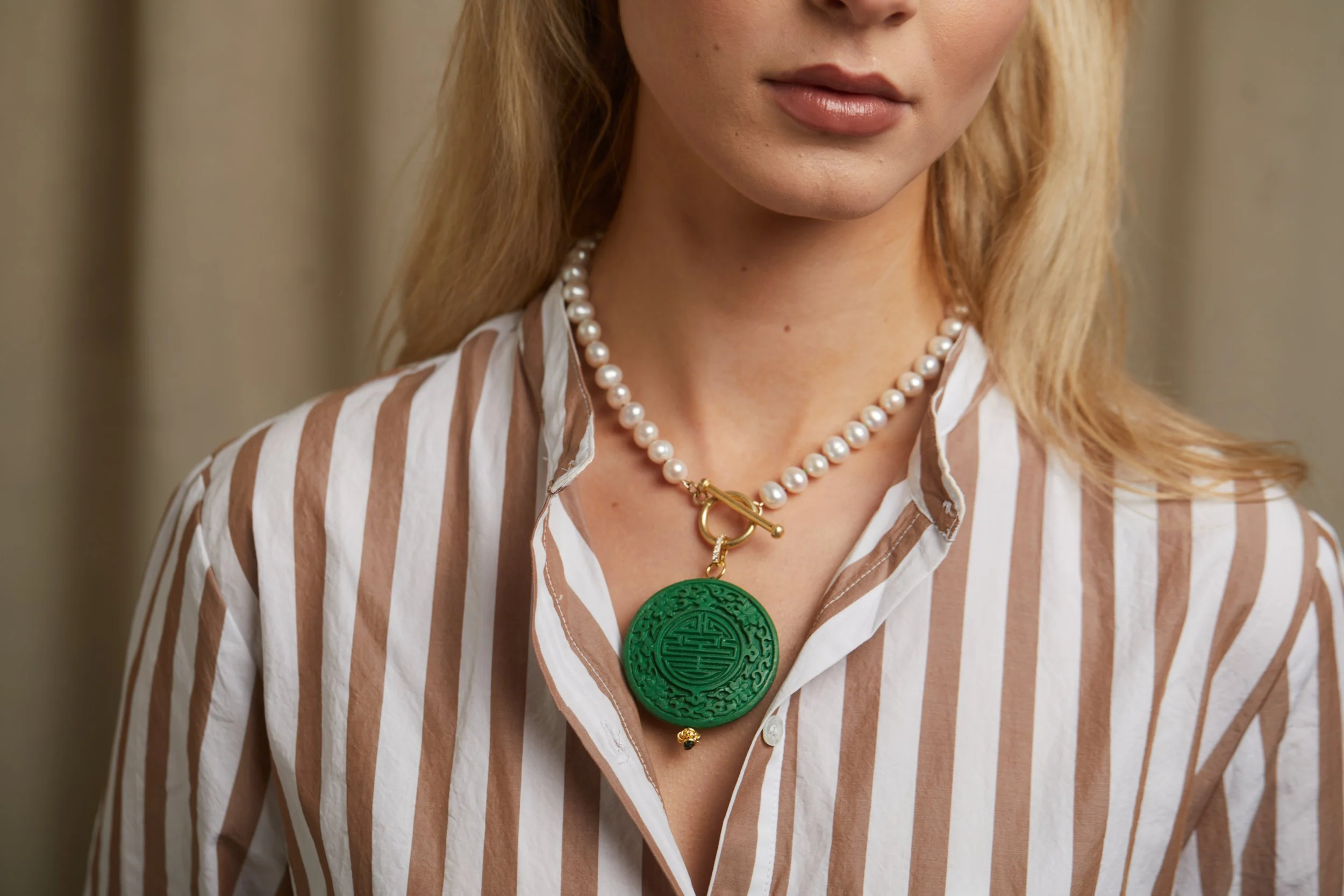 Pearl NK with Green Cinnabar on model.jpg